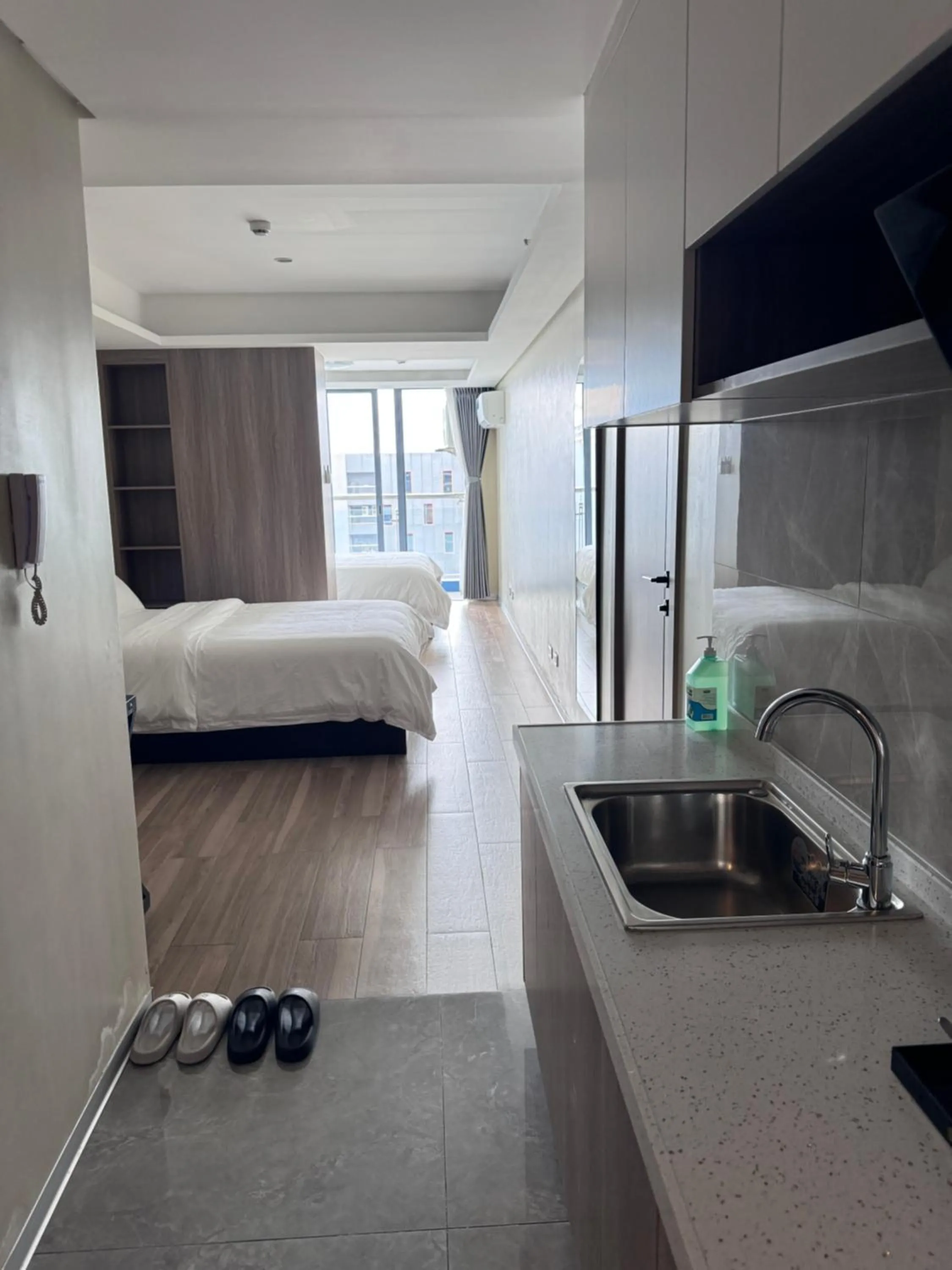 Bed in LCONDOTEL Hotel Studio with Balcony at Imperial Plaza near MOA NAIA PITX