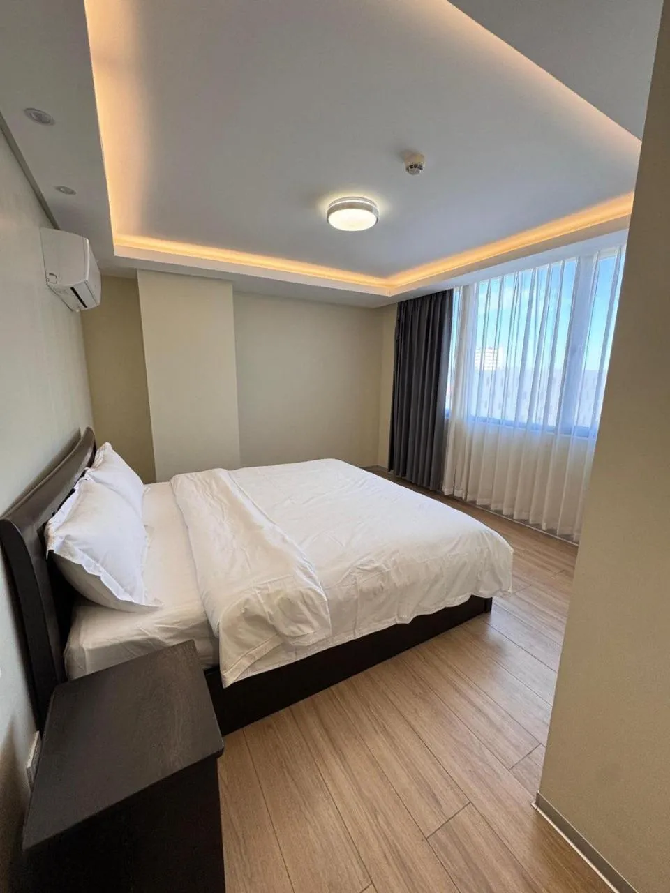 Bed in LCONDOTEL Hotel Studio with Balcony at Imperial Plaza near MOA NAIA PITX