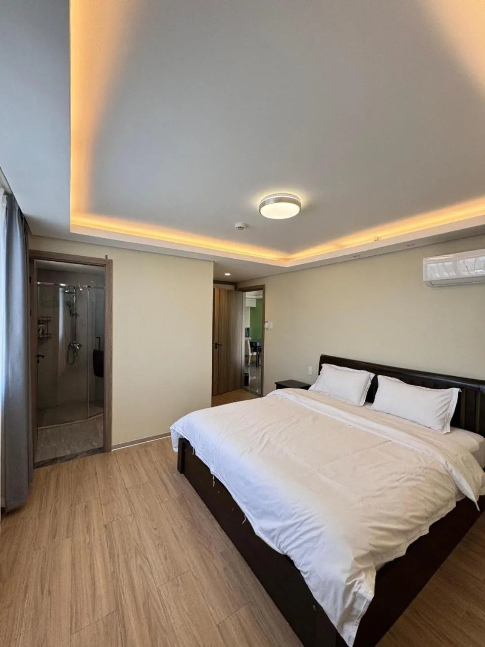Bed in LCONDOTEL Hotel Studio with Balcony at Imperial Plaza near MOA NAIA PITX