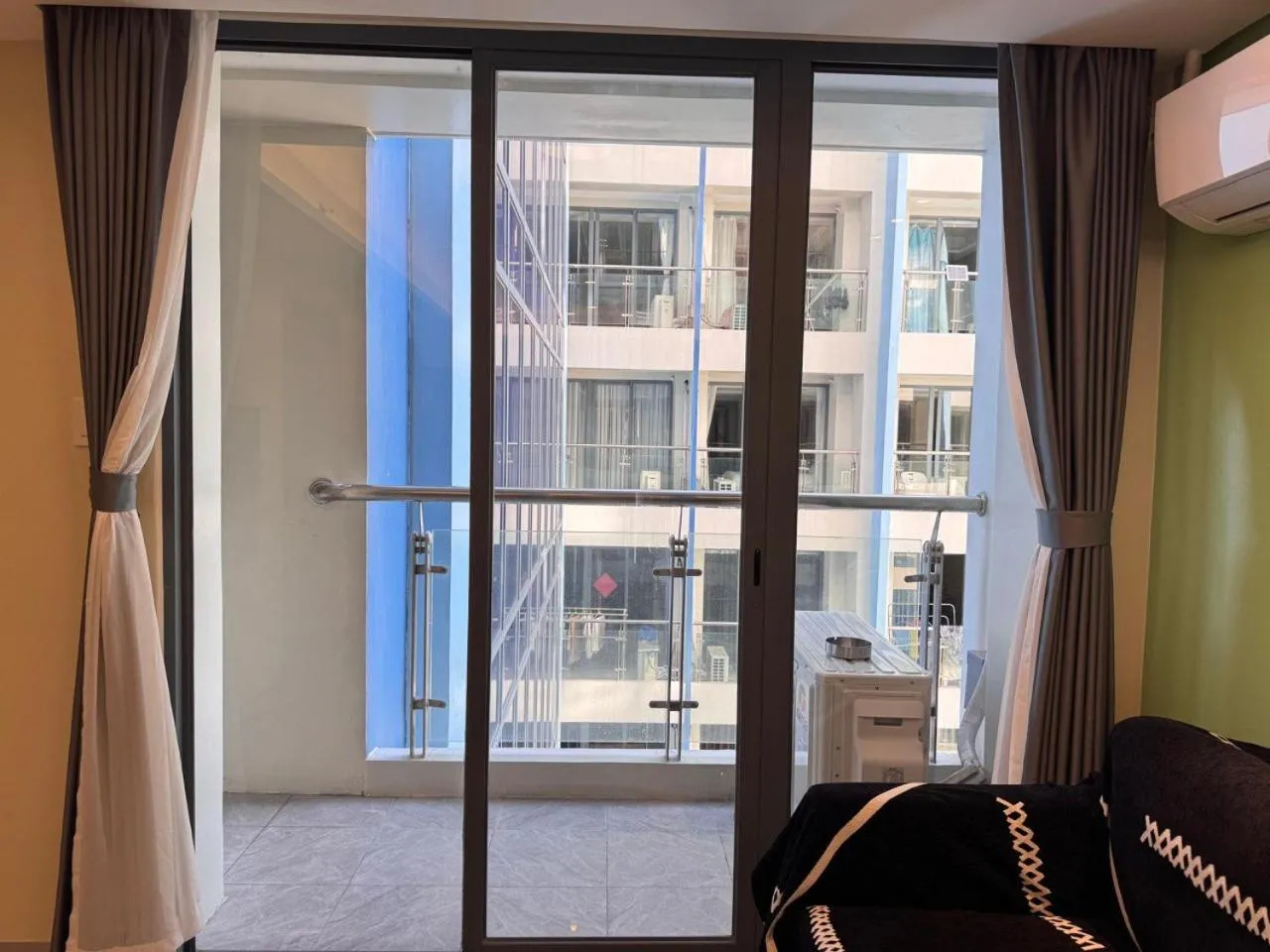 Living room in LCONDOTEL Hotel Studio with Balcony at Imperial Plaza near MOA NAIA PITX