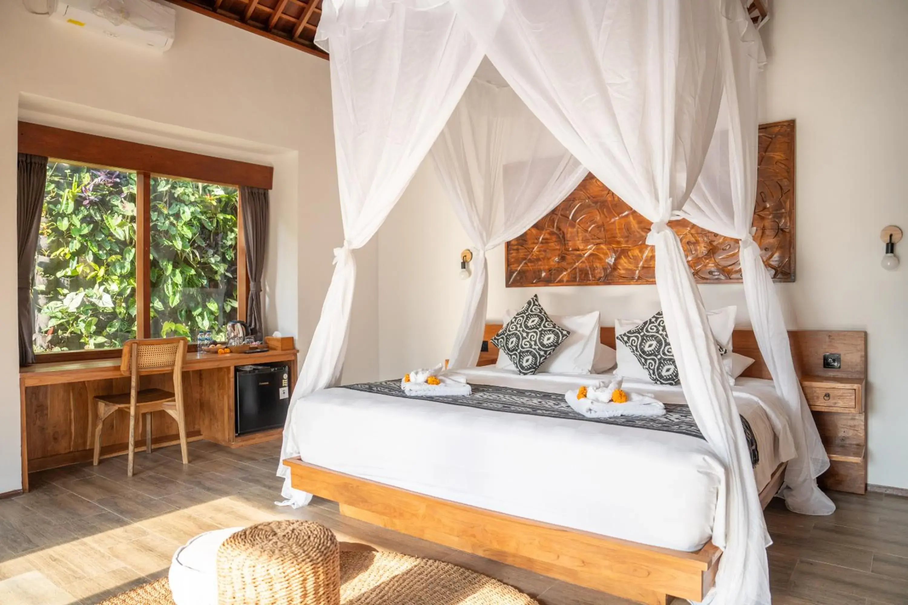 Bed in Moonterra Villa Ubud by Dhananjaya Hospitality Bed in Moonterra Villa Ubud by Dhananjaya Hospitality