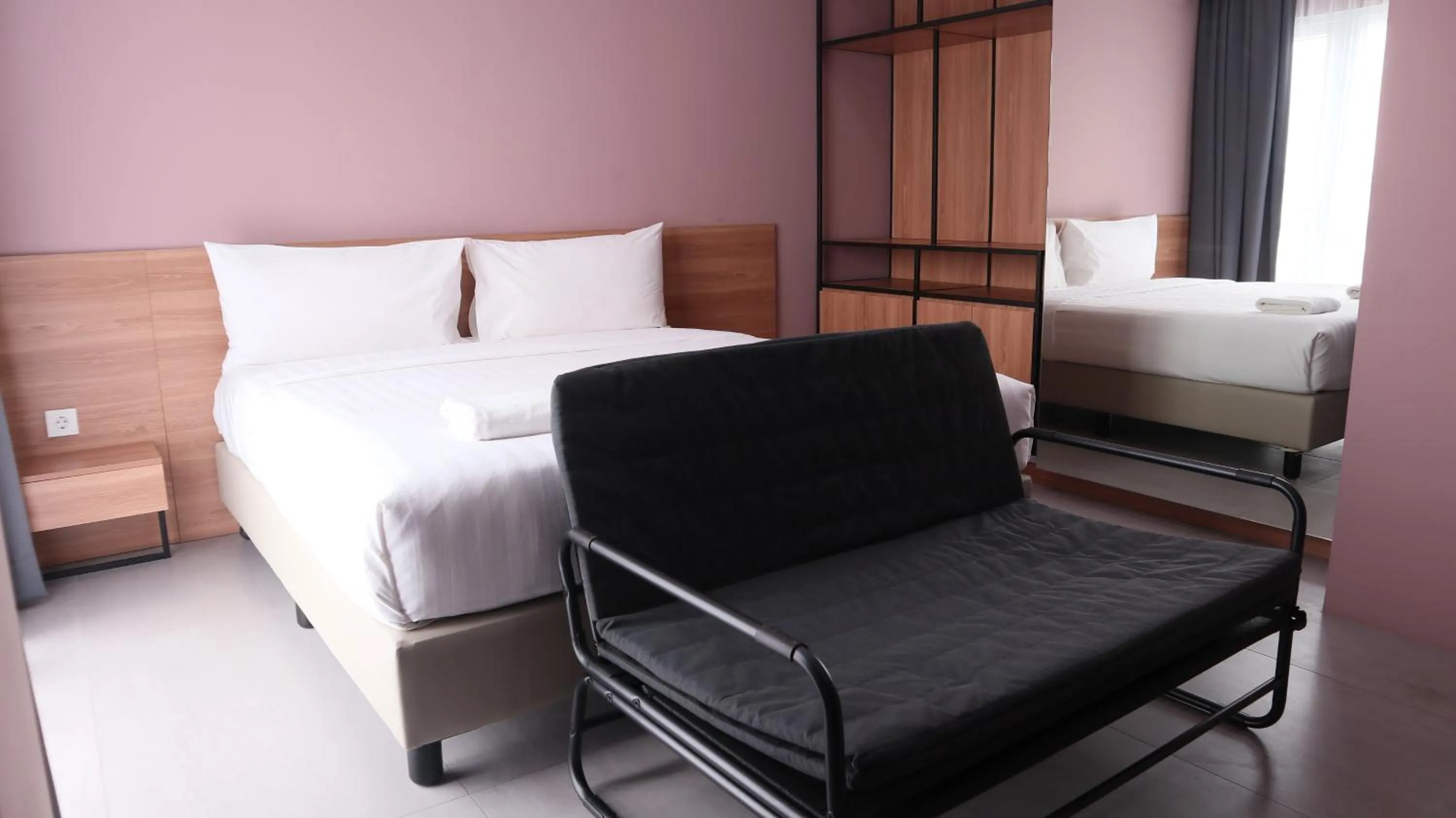 Bed in VNC Alam Sutera Hotel Powered by Archipelago