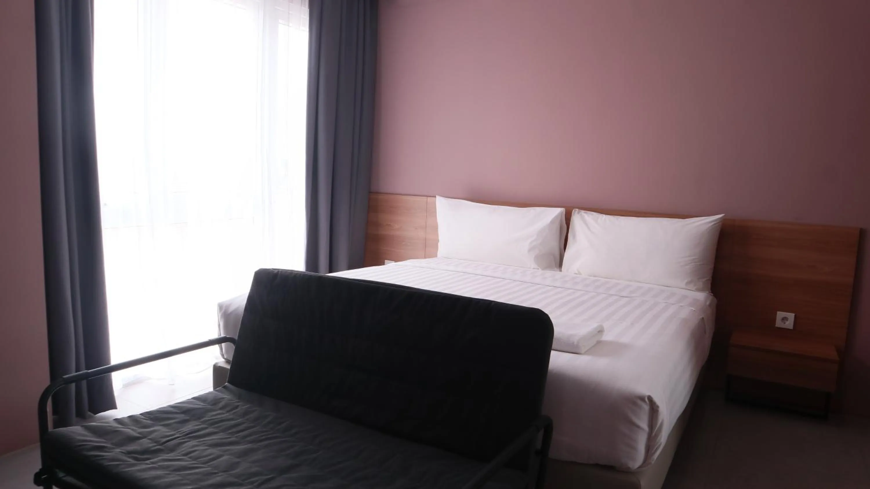 Bed in VNC Alam Sutera Hotel Powered by Archipelago