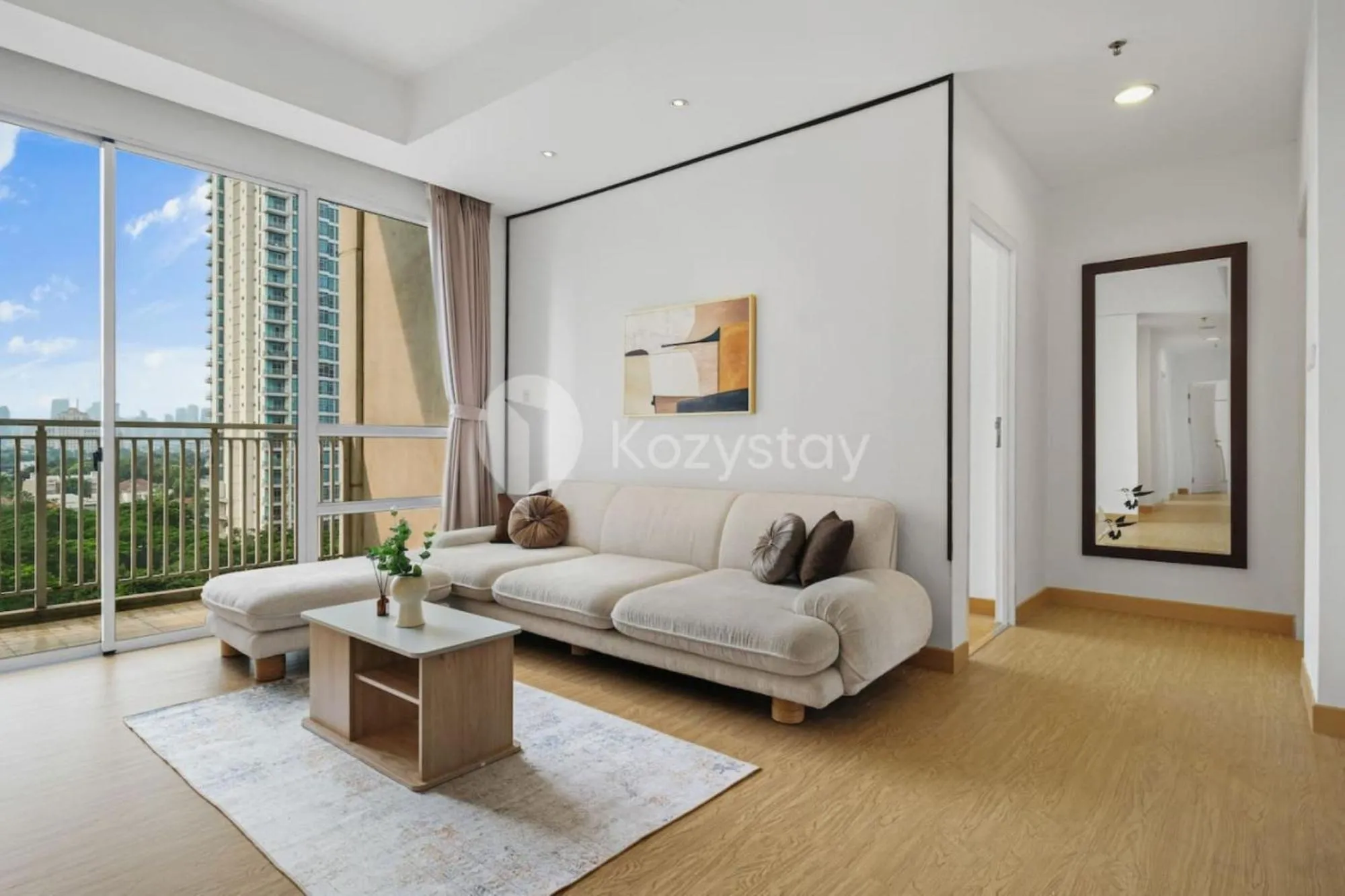 Living room in Sienna by Kozystay - Dharmawangsa