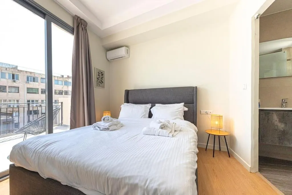 Bed in Smart Apartments