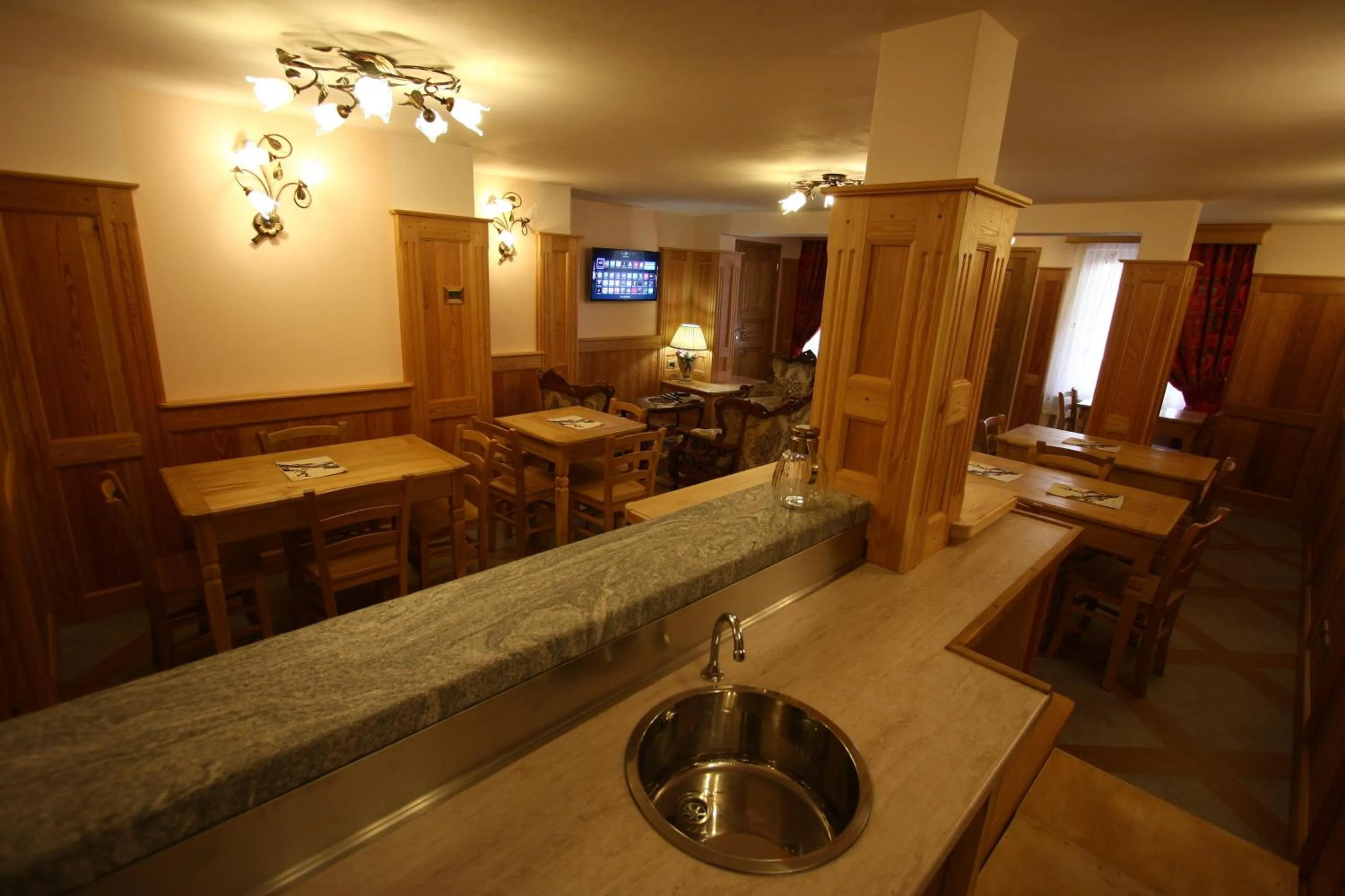 Communal lounge/ TV room in Villa Giuditta Residence