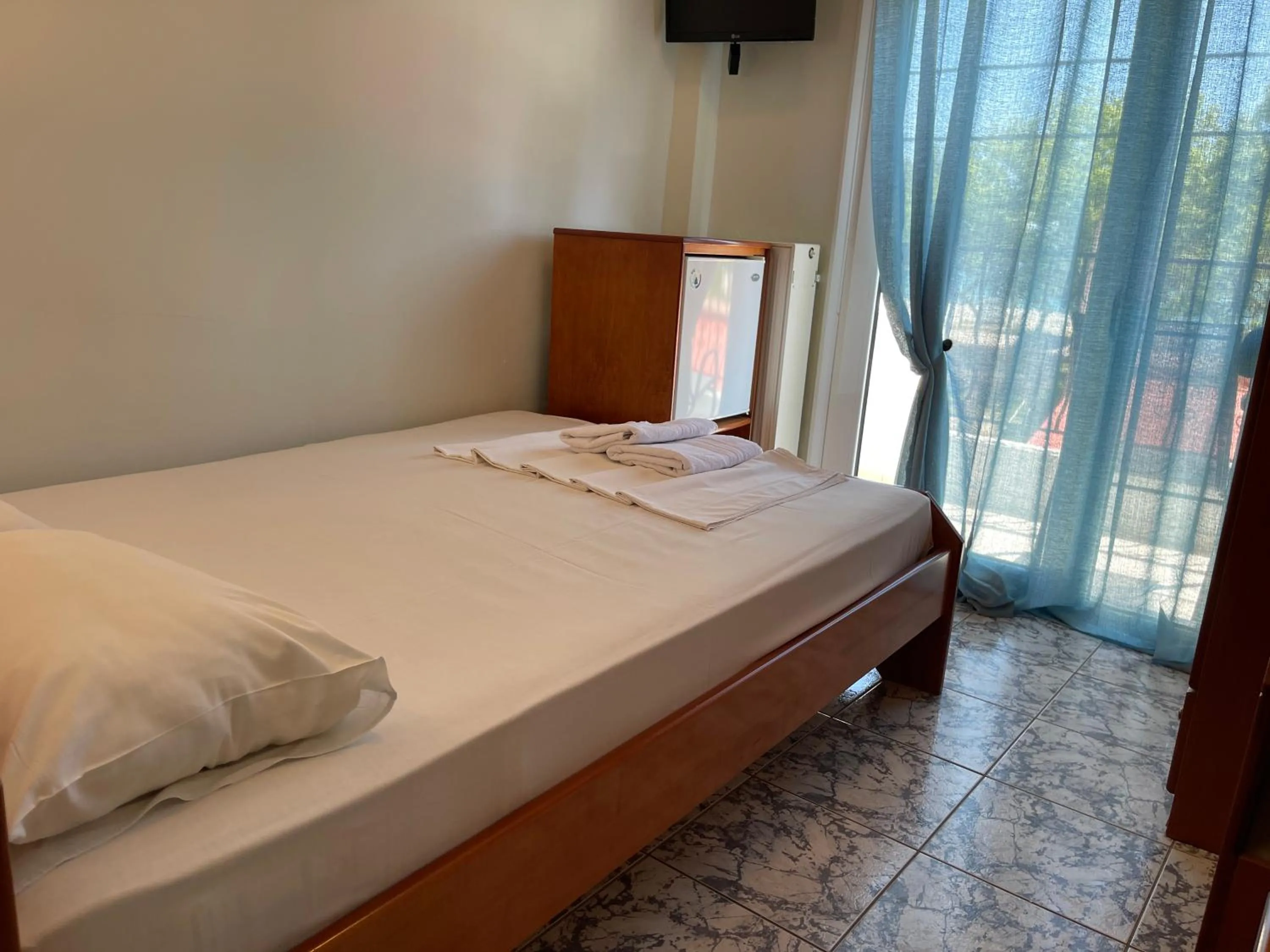 Bed in Indigo sea view rooms