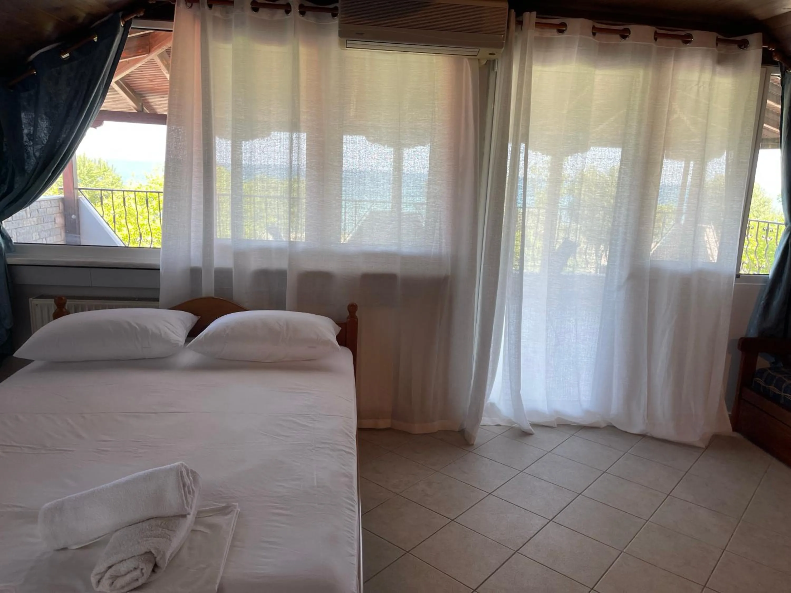 Bed in Indigo sea view rooms