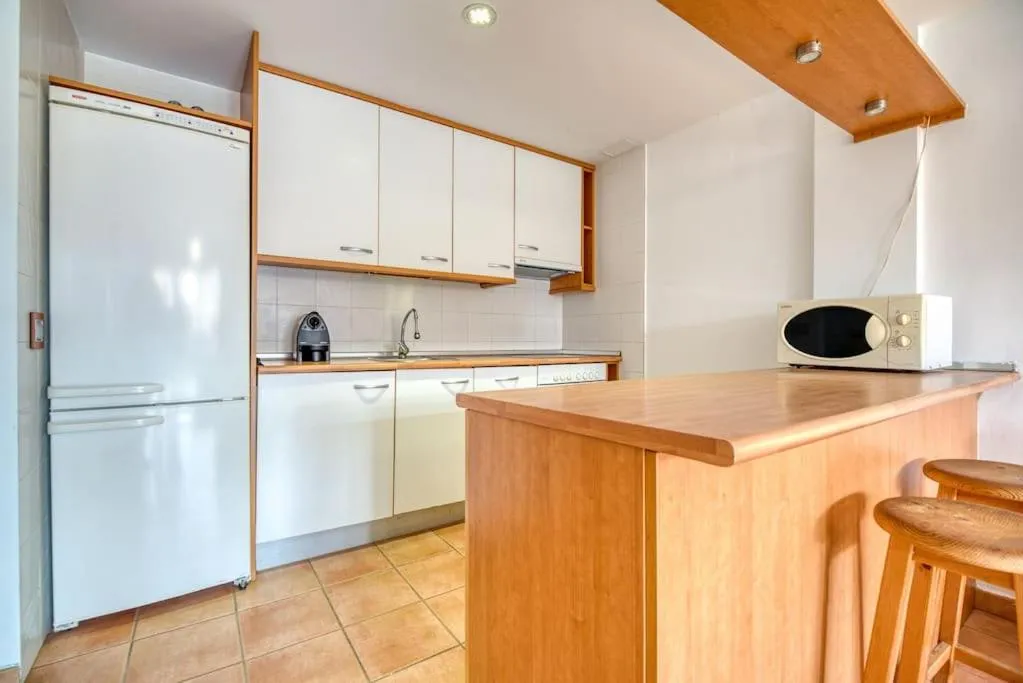 Kitchen or kitchenette in Piso para vacaciones familiares
