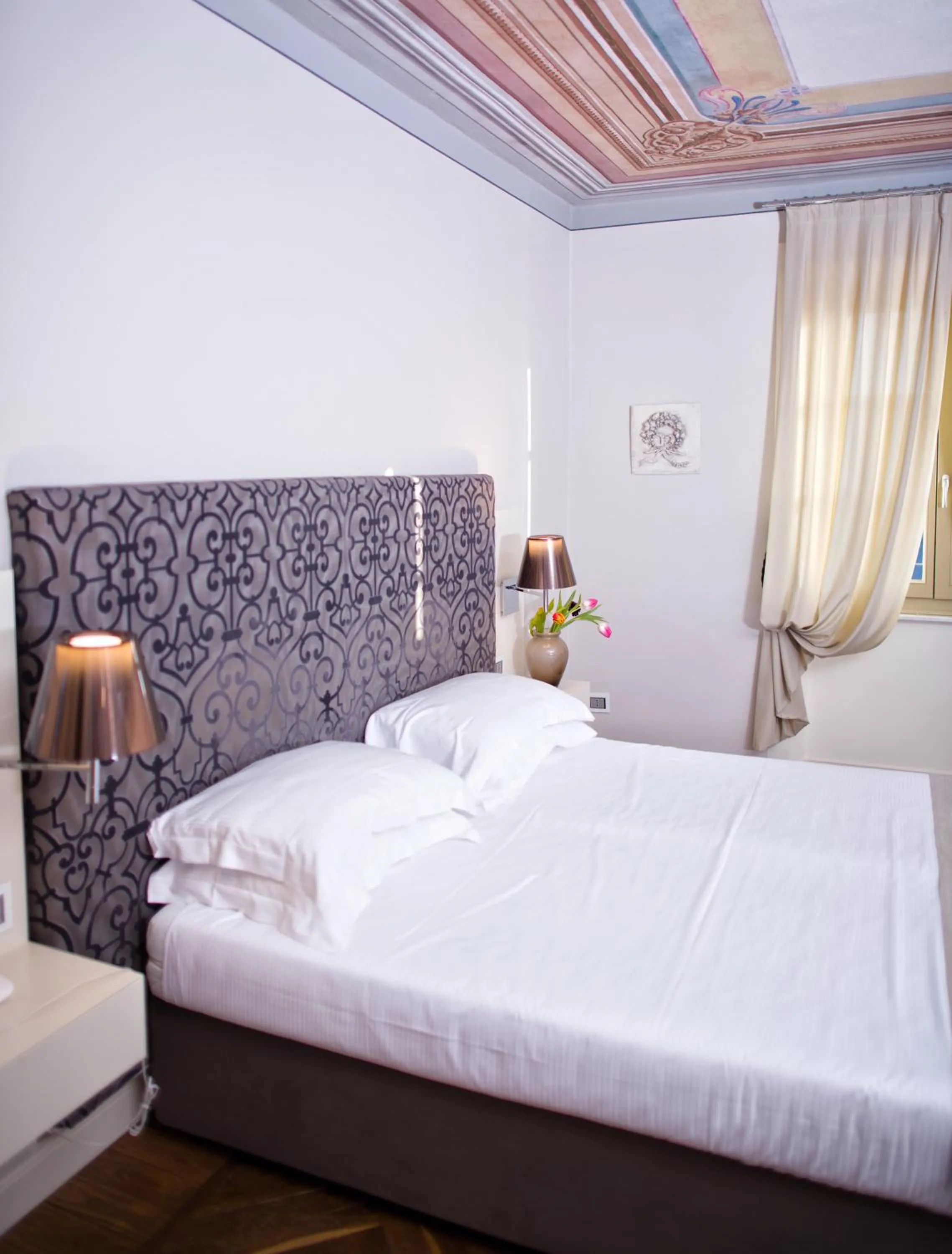 Bed in Villa Fontana Relais Suite & Spa