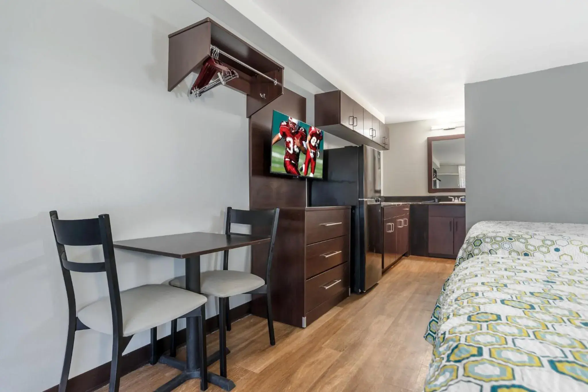 Bedroom, Bed in HomeTowne Studios by Red Roof Montgomery - Midtown Bedroom, Bed in HomeTowne Studios by Red Roof Montgomery - Midtown