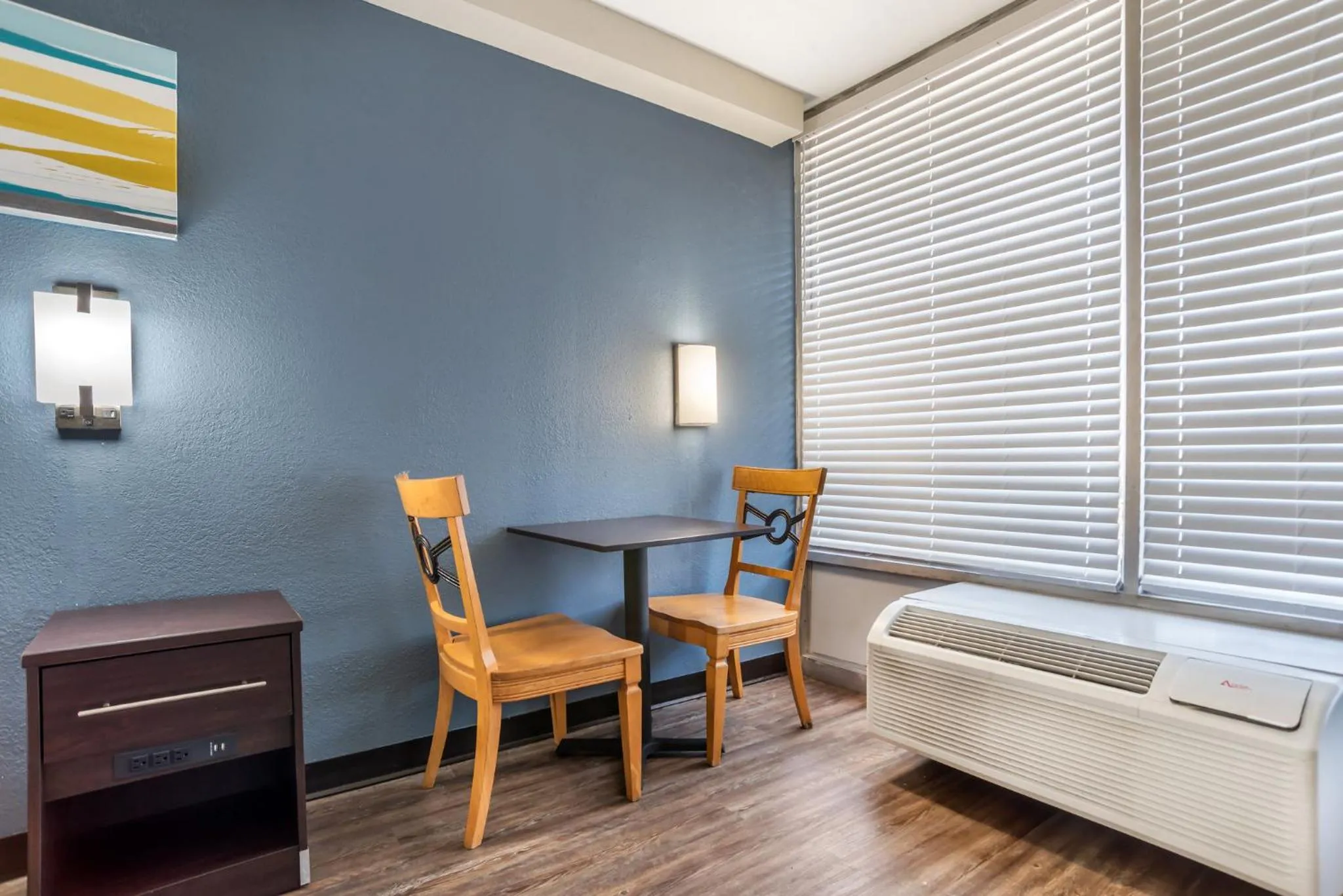 Bedroom in HomeTowne Studios by Red Roof Montgomery - Midtown