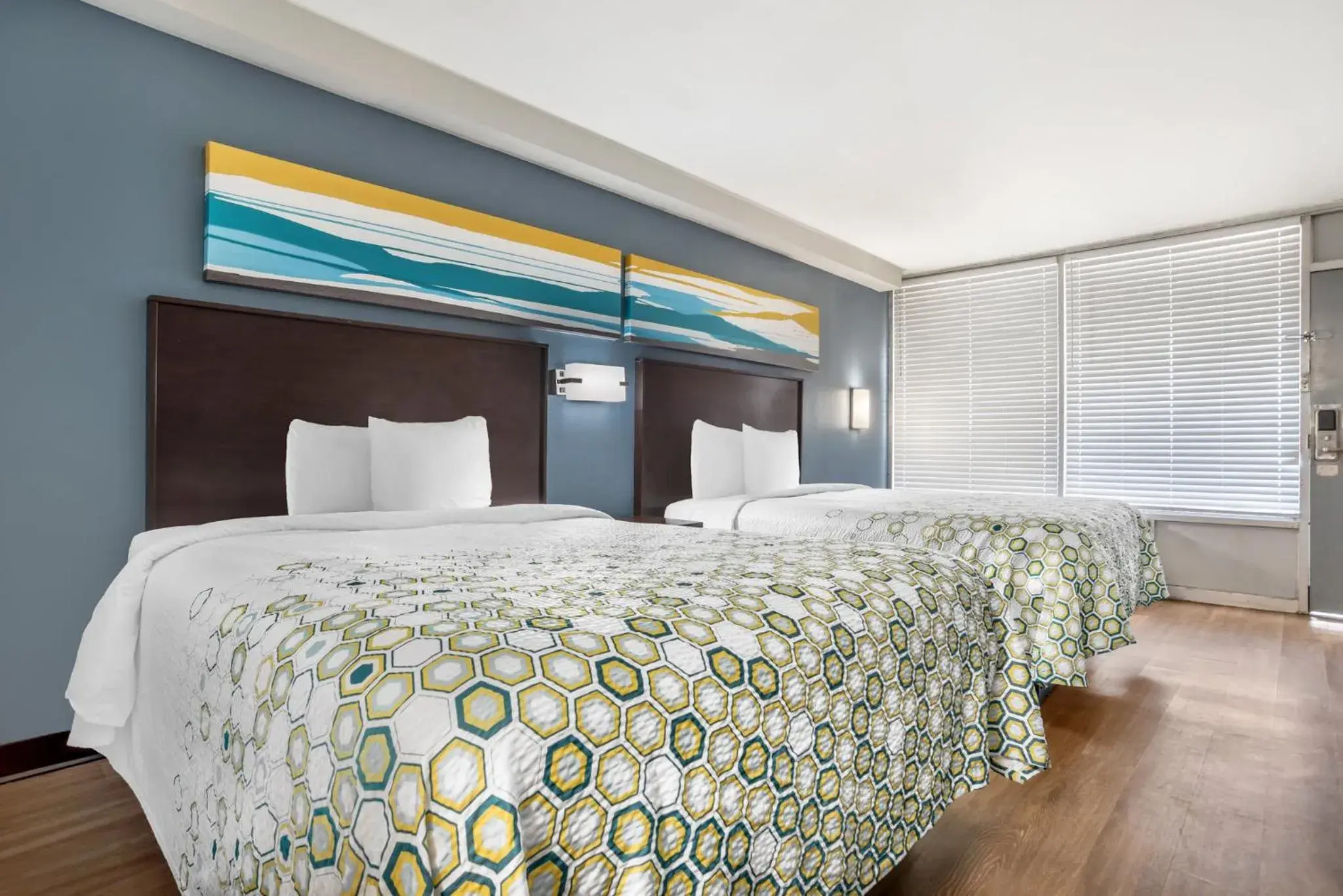 Bedroom, Bed in HomeTowne Studios by Red Roof Montgomery - Midtown Bedroom, Bed in HomeTowne Studios by Red Roof Montgomery - Midtown