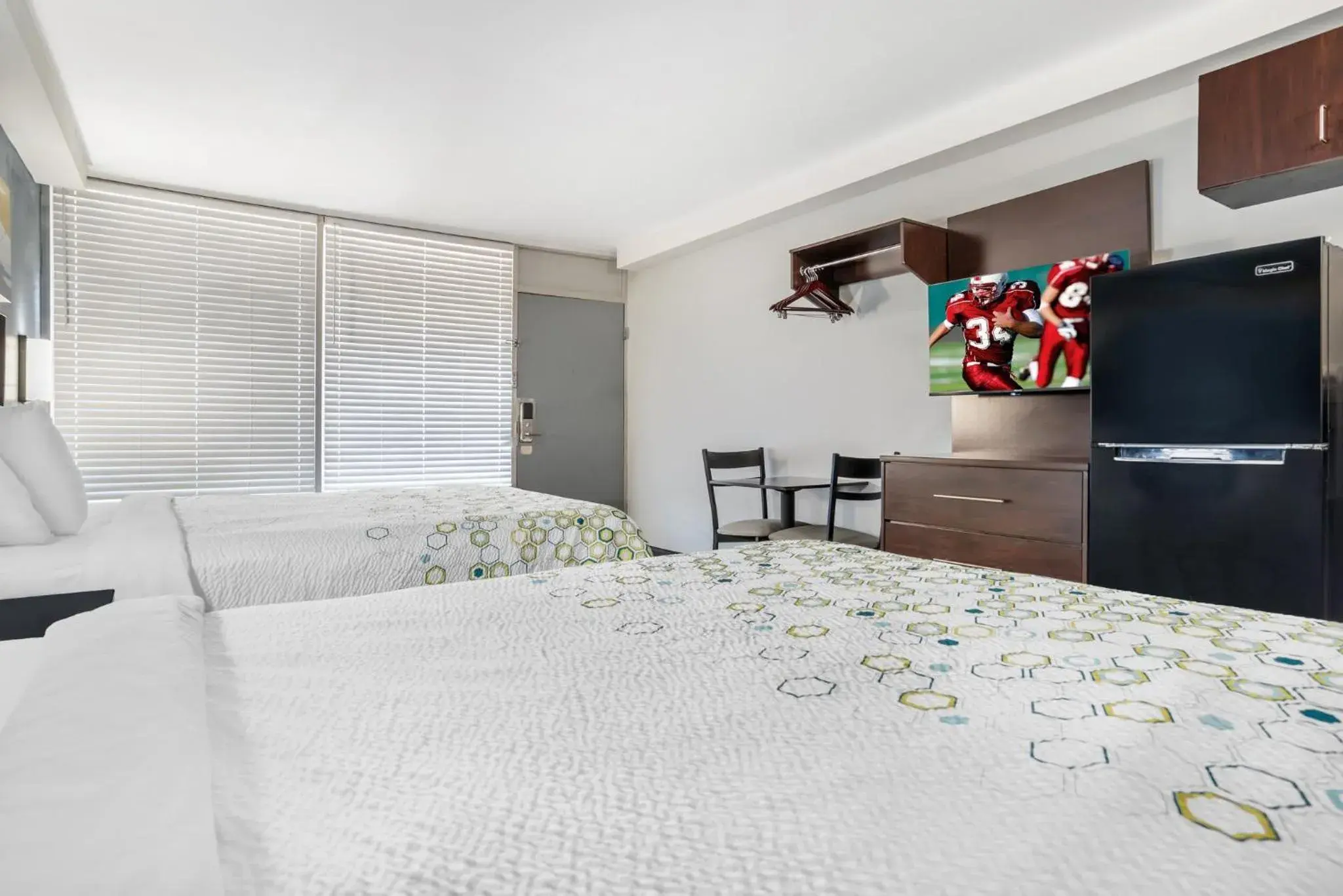 Bedroom, Bed in HomeTowne Studios by Red Roof Montgomery - Midtown Bedroom, Bed in HomeTowne Studios by Red Roof Montgomery - Midtown