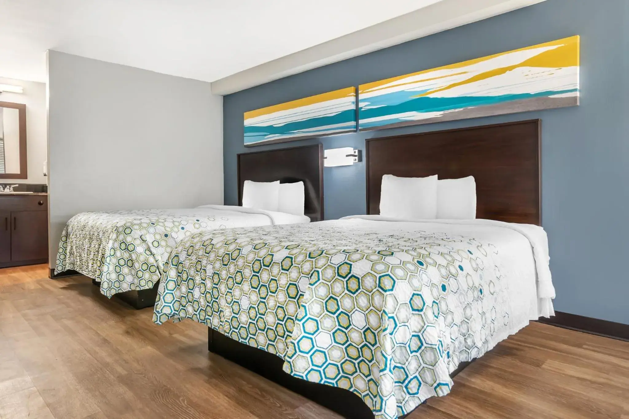 Bedroom, Bed in HomeTowne Studios by Red Roof Montgomery - Midtown Bedroom, Bed in HomeTowne Studios by Red Roof Montgomery - Midtown