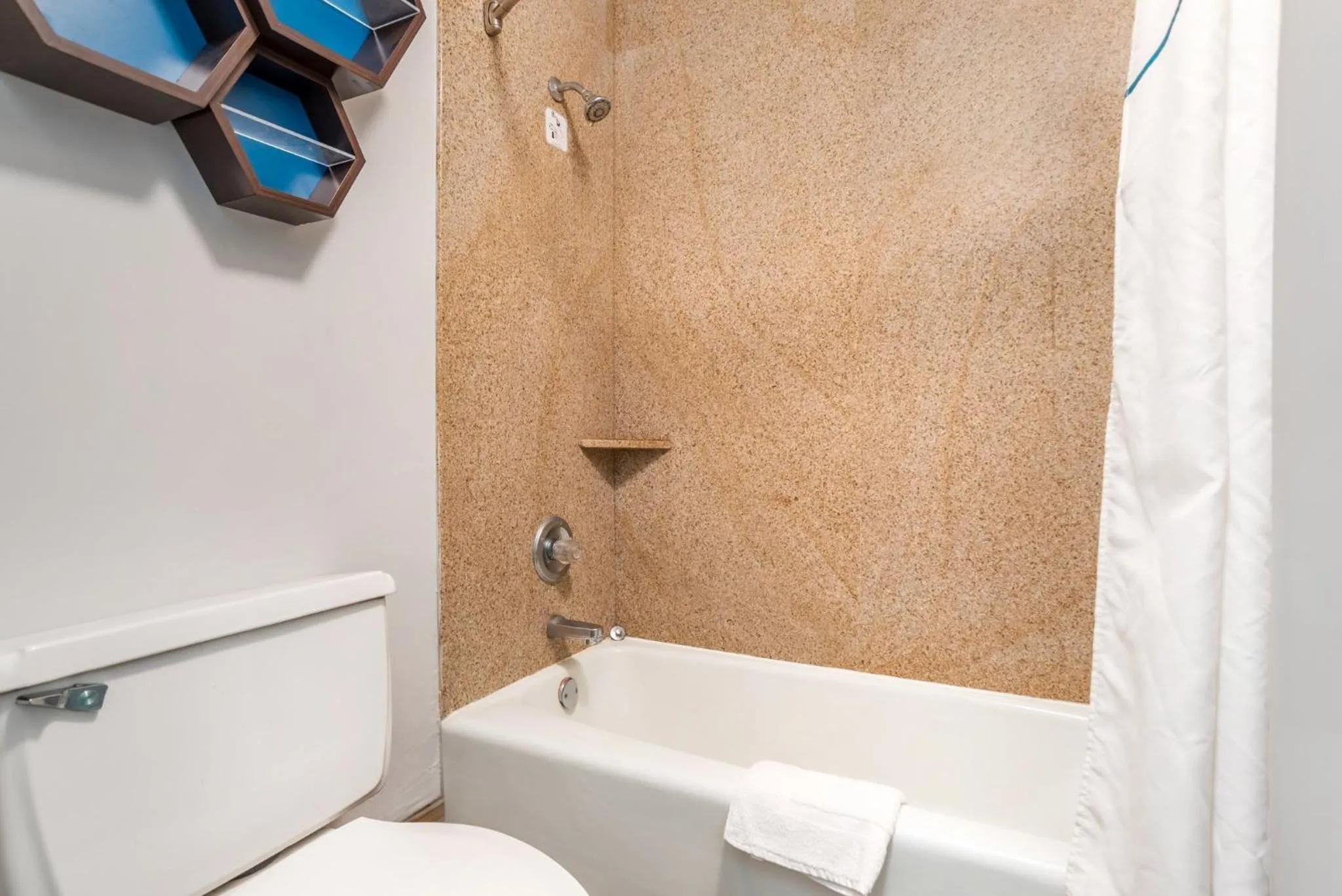 Bathroom in HomeTowne Studios by Red Roof Montgomery - Midtown