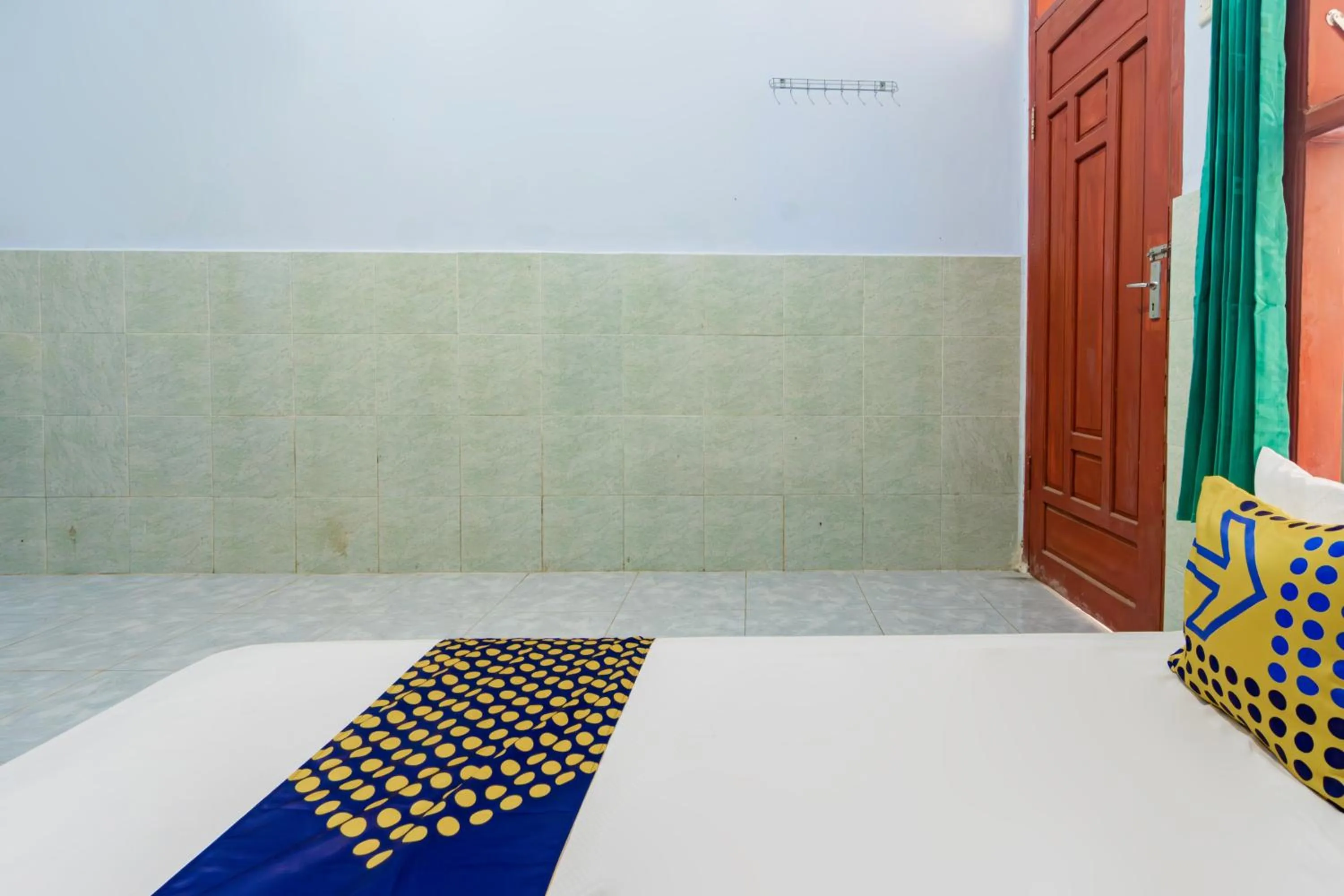 Bedroom in SPOT ON 93965 Ibrahim Guest House Syariah