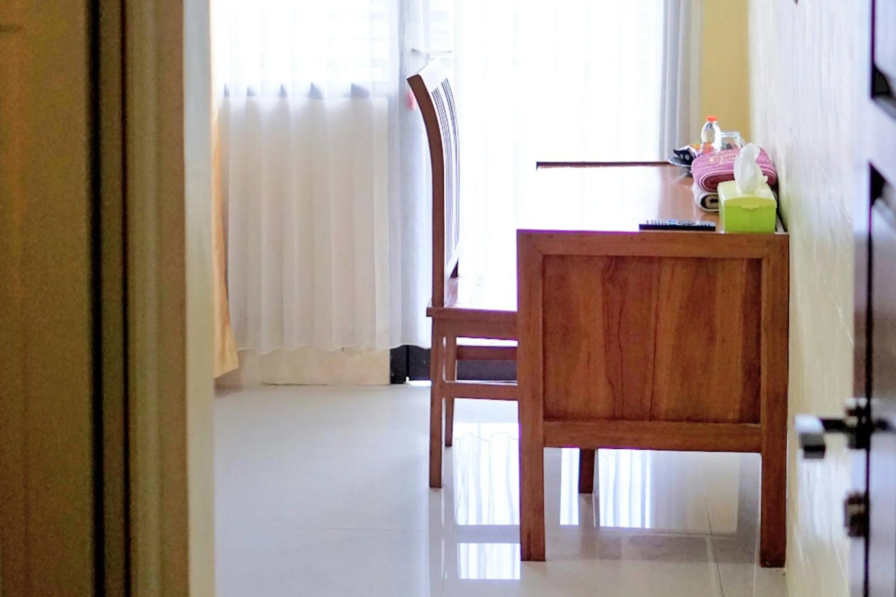 Seating area in Griya Pradipa Syariah Near Balai Kota Batu Mitra RedDoorz