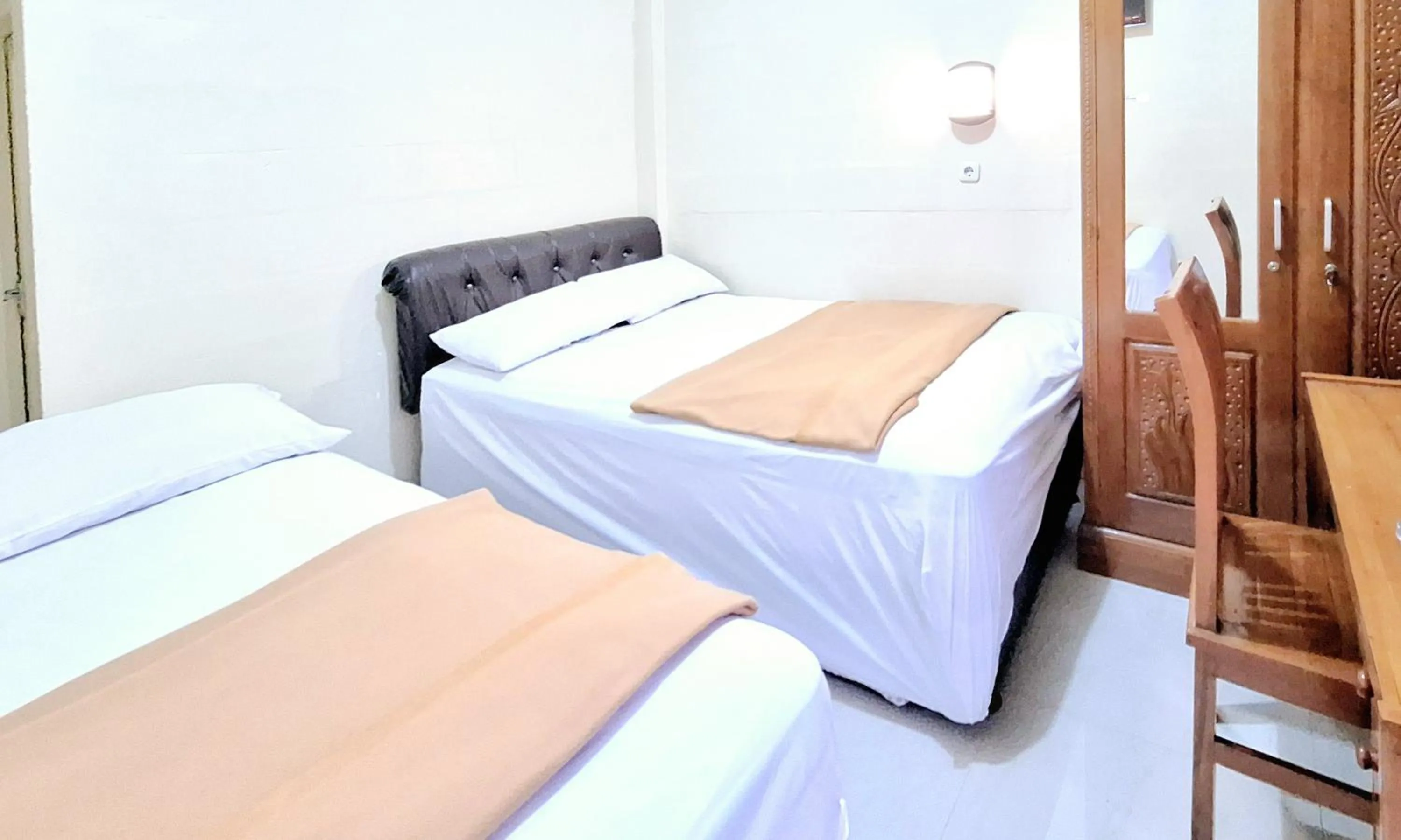 Bedroom in Griya Pradipa Syariah Near Balai Kota Batu Mitra RedDoorz