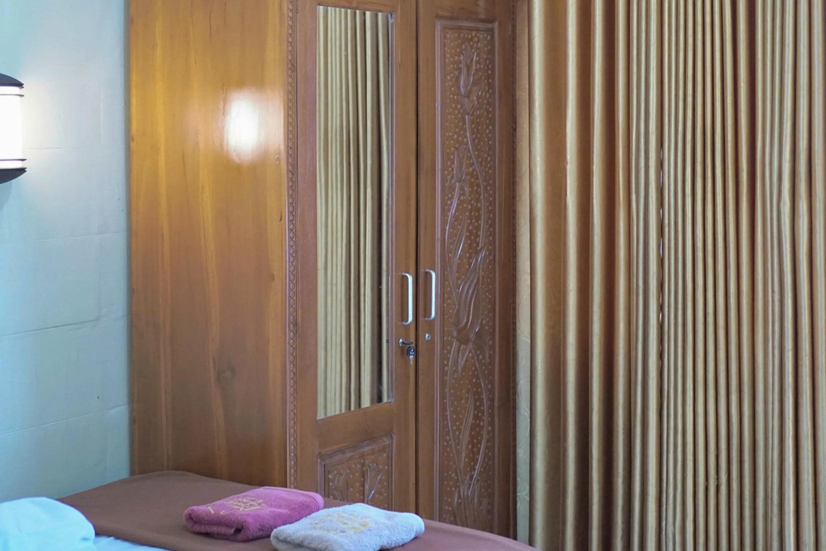 Bedroom in Griya Pradipa Syariah Near Balai Kota Batu Mitra RedDoorz