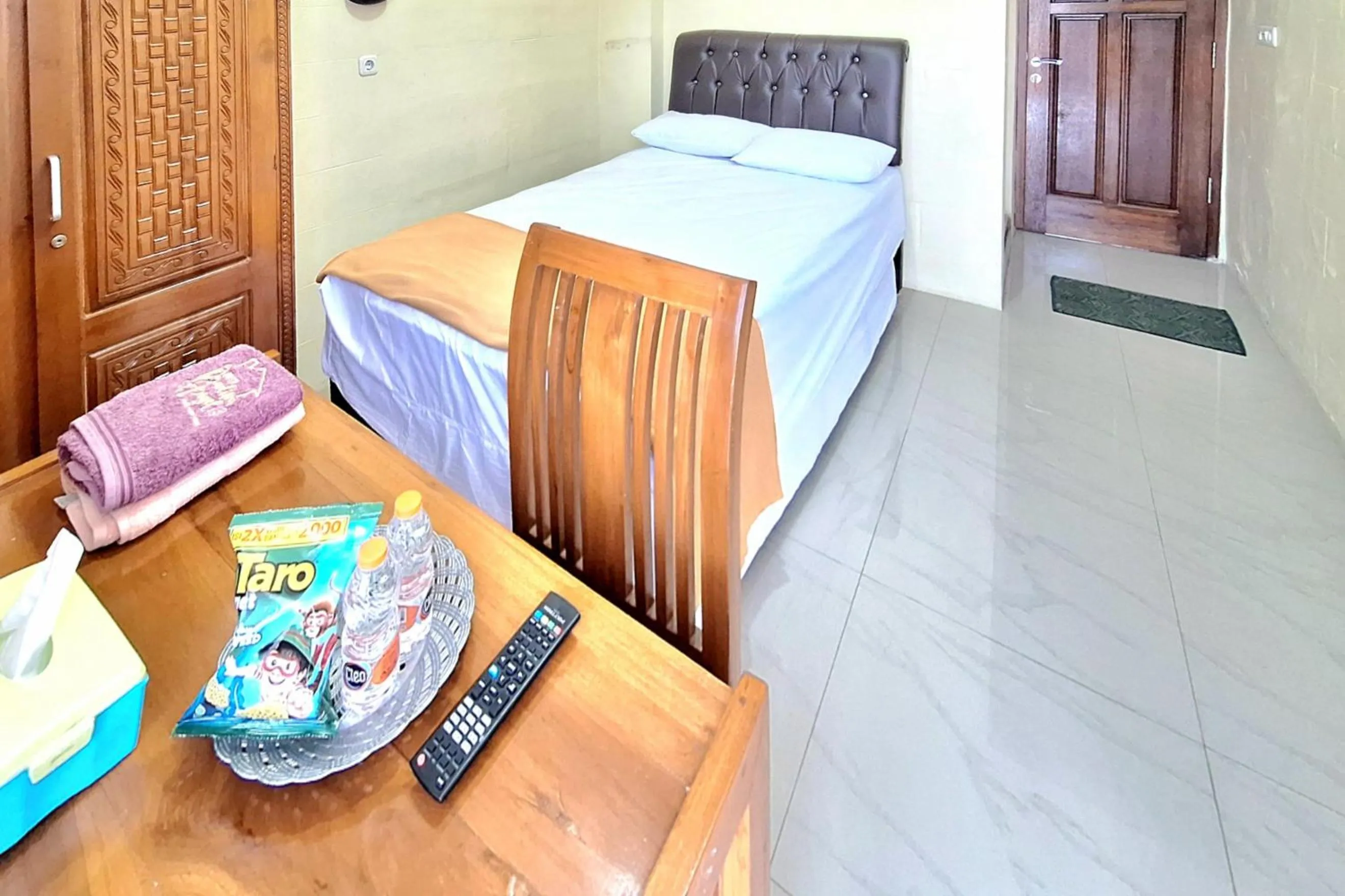 Bedroom in Griya Pradipa Syariah Near Balai Kota Batu Mitra RedDoorz