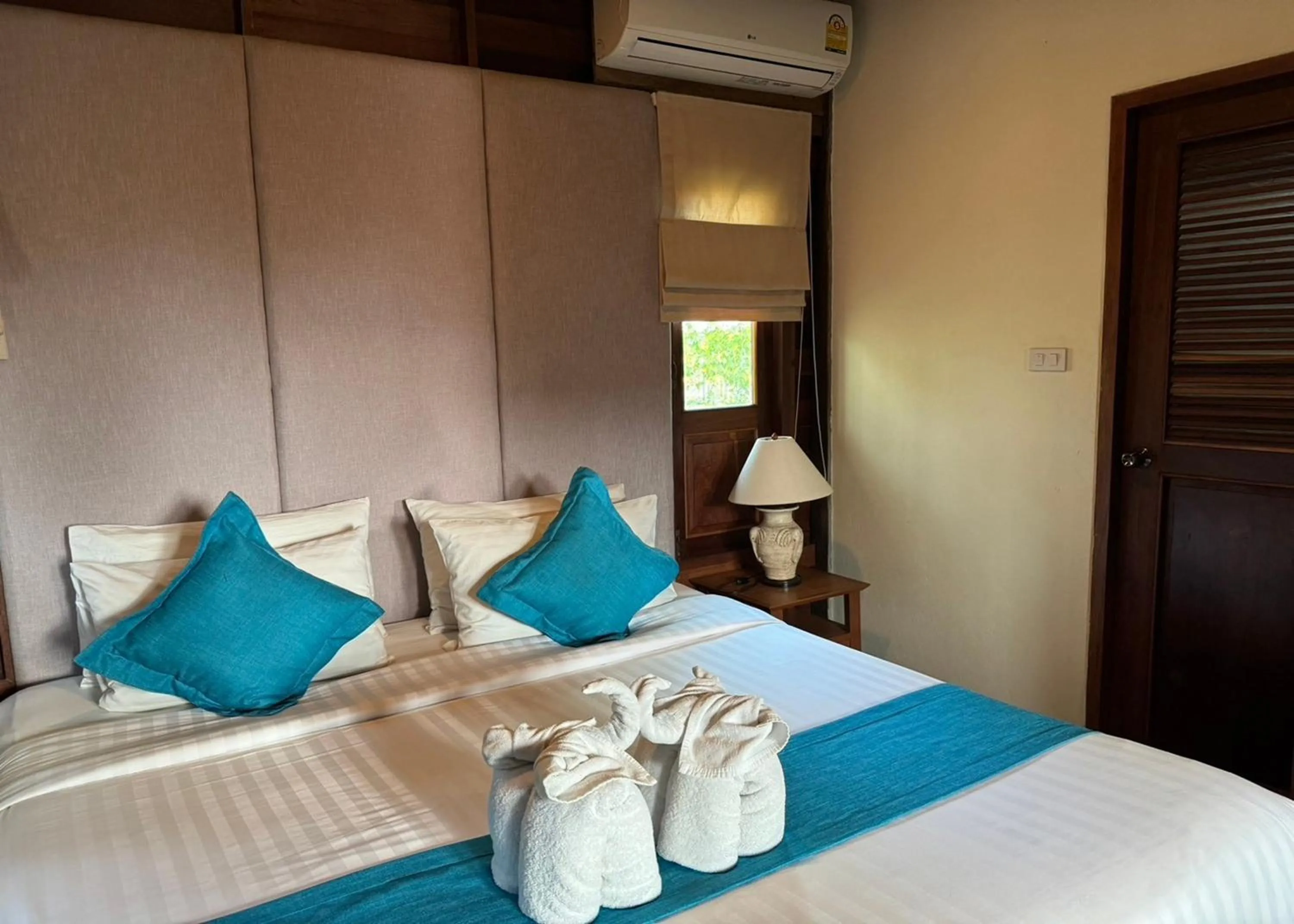 Bed in Karina Resort Chiang Mai