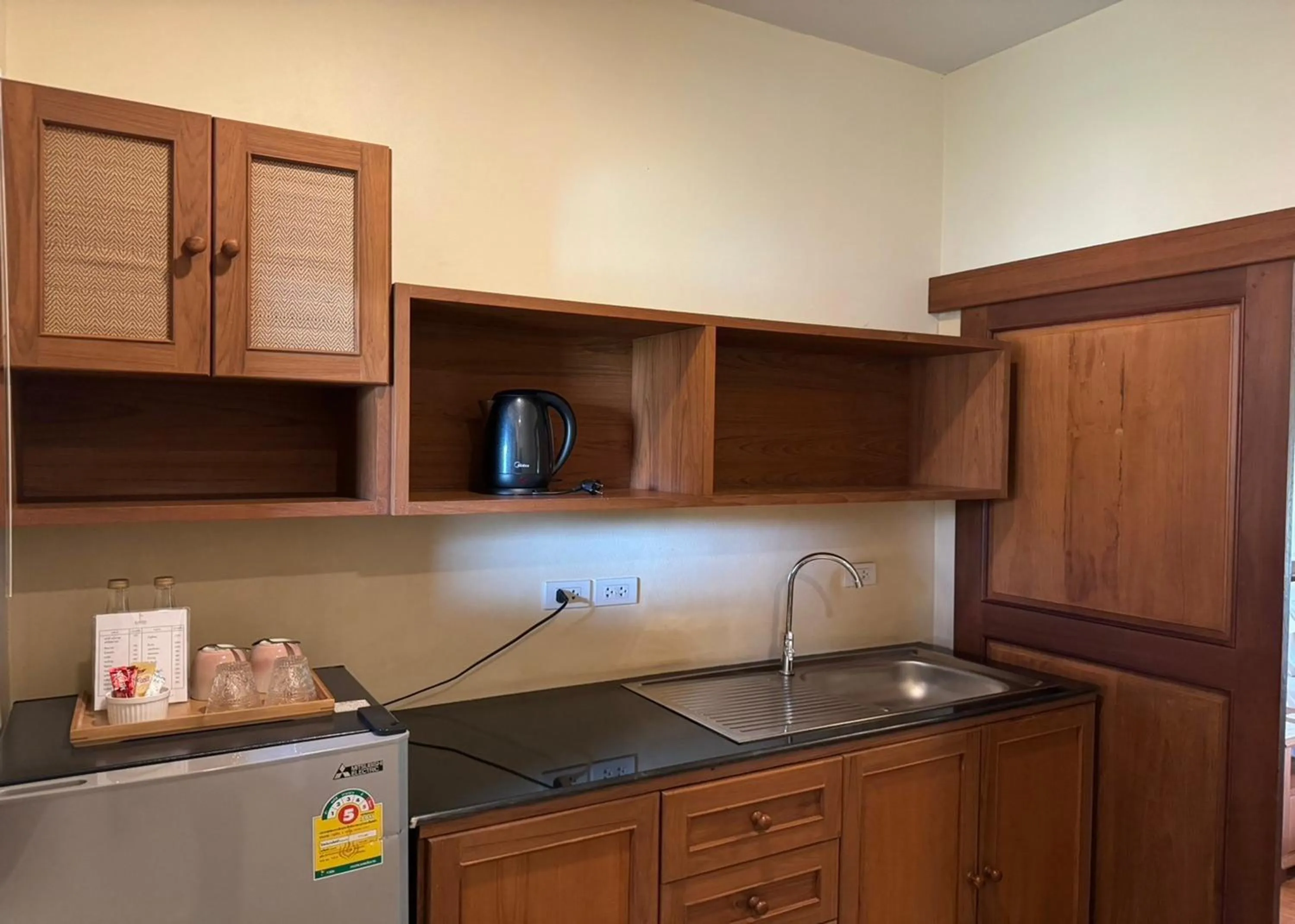 Kitchen or kitchenette in Karina Resort Chiang Mai