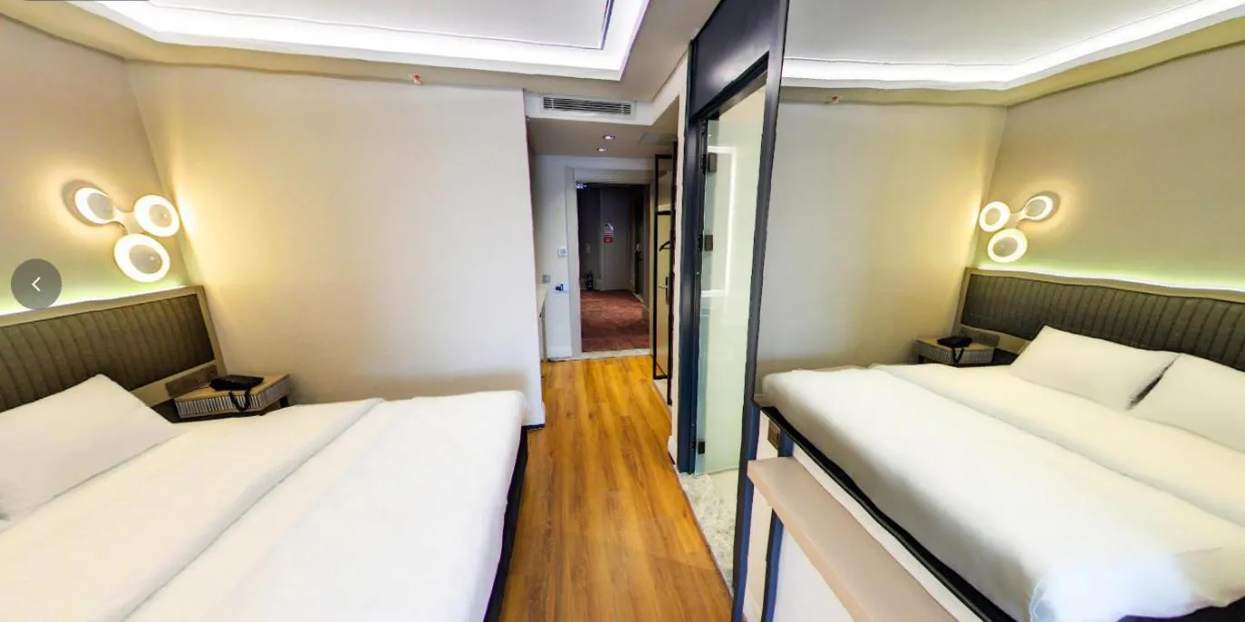 Bed in Theodosius Hotel
