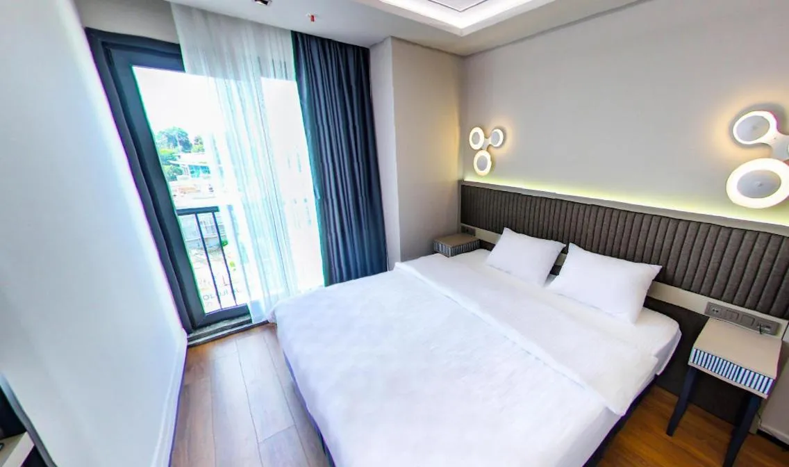 Bed in Theodosius Hotel