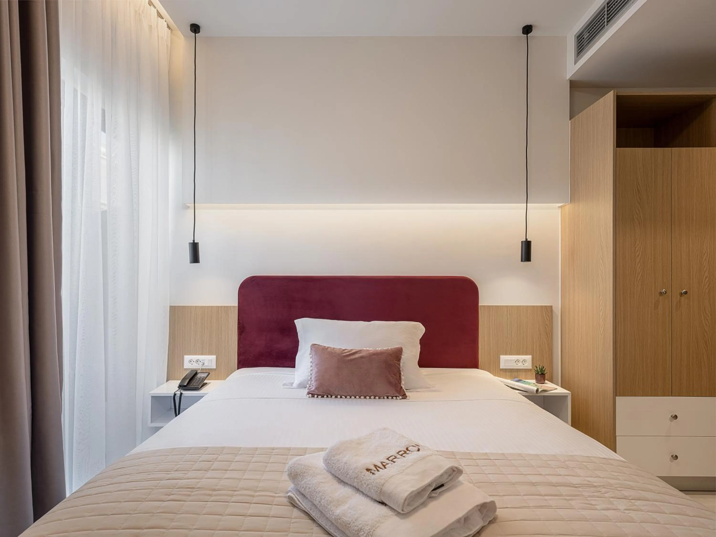 Bed in Miss Marrone City Hotel