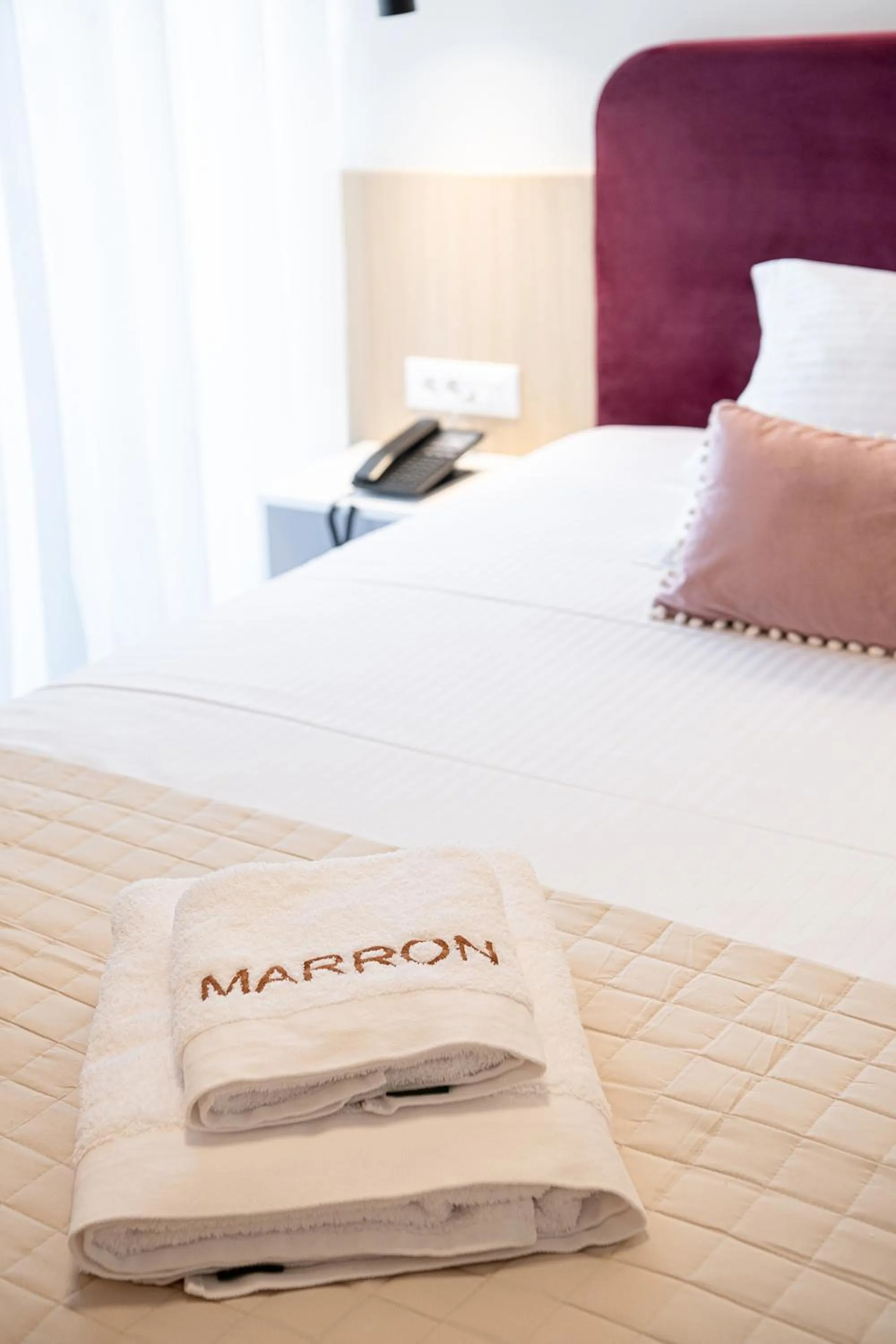 Bed in Miss Marrone City Hotel