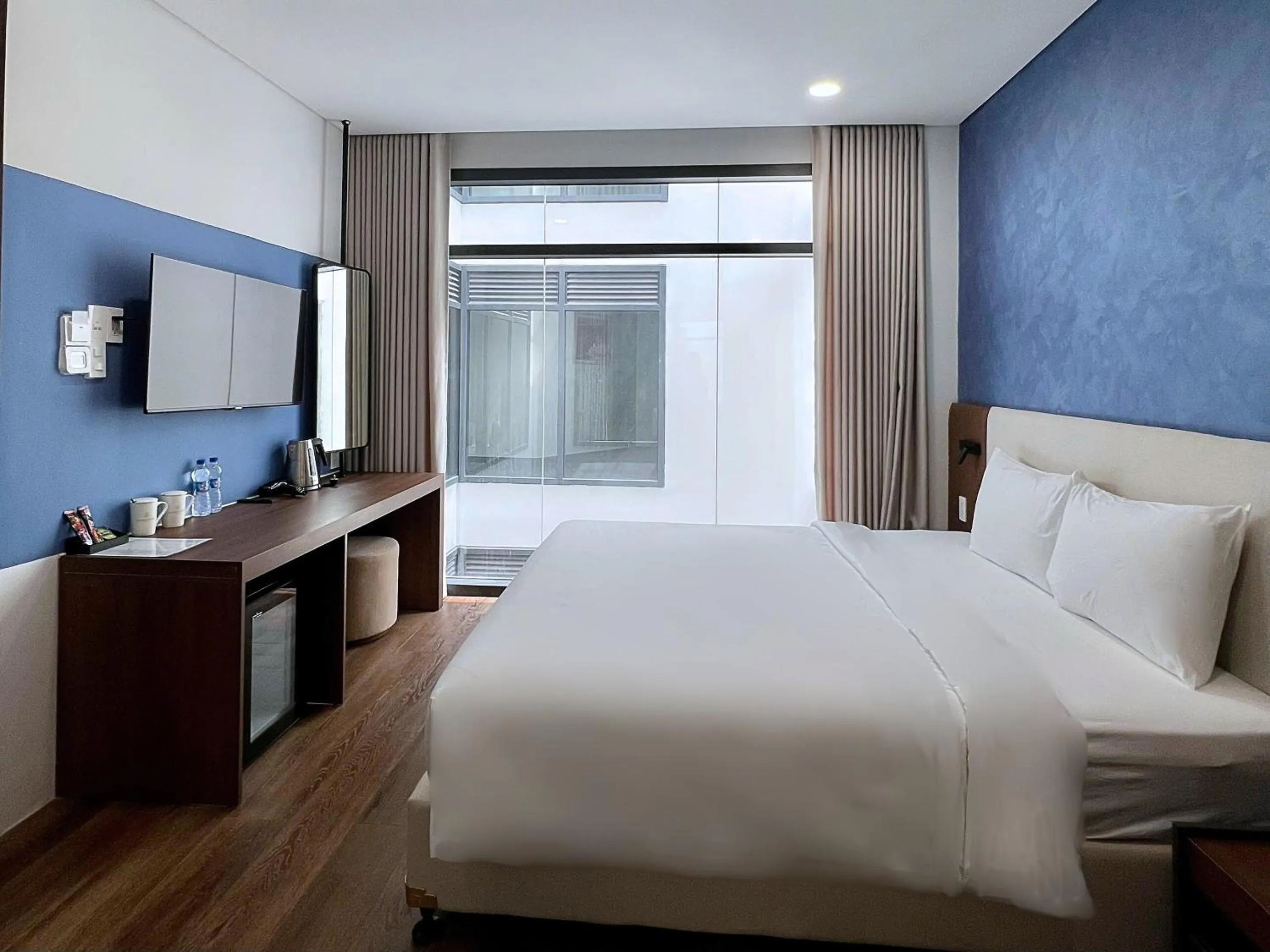 Bed in Glamour Boutique Hotel