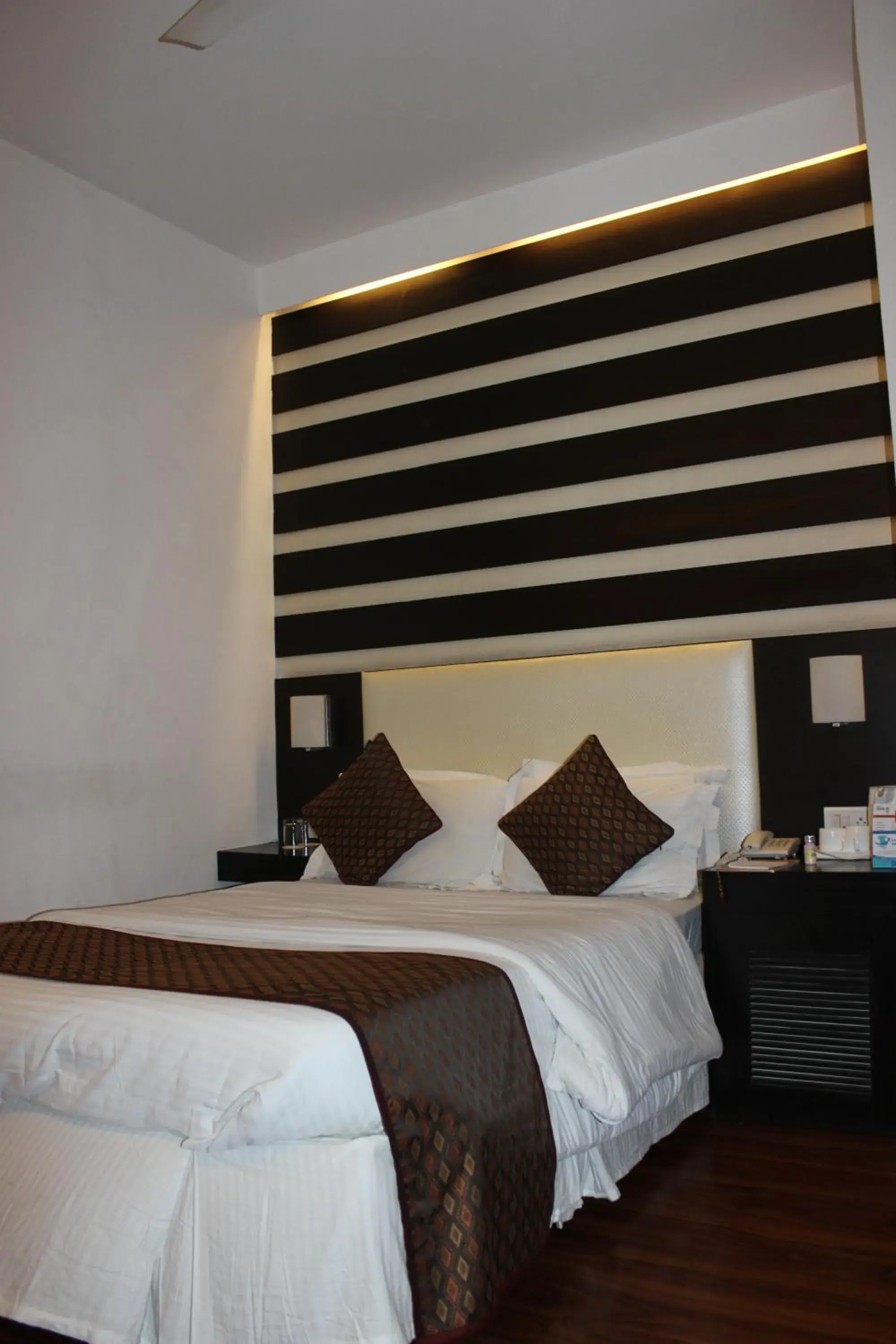 Bed in Hotel Jukaso Inn Down Town Bed in Hotel Jukaso Inn Down Town