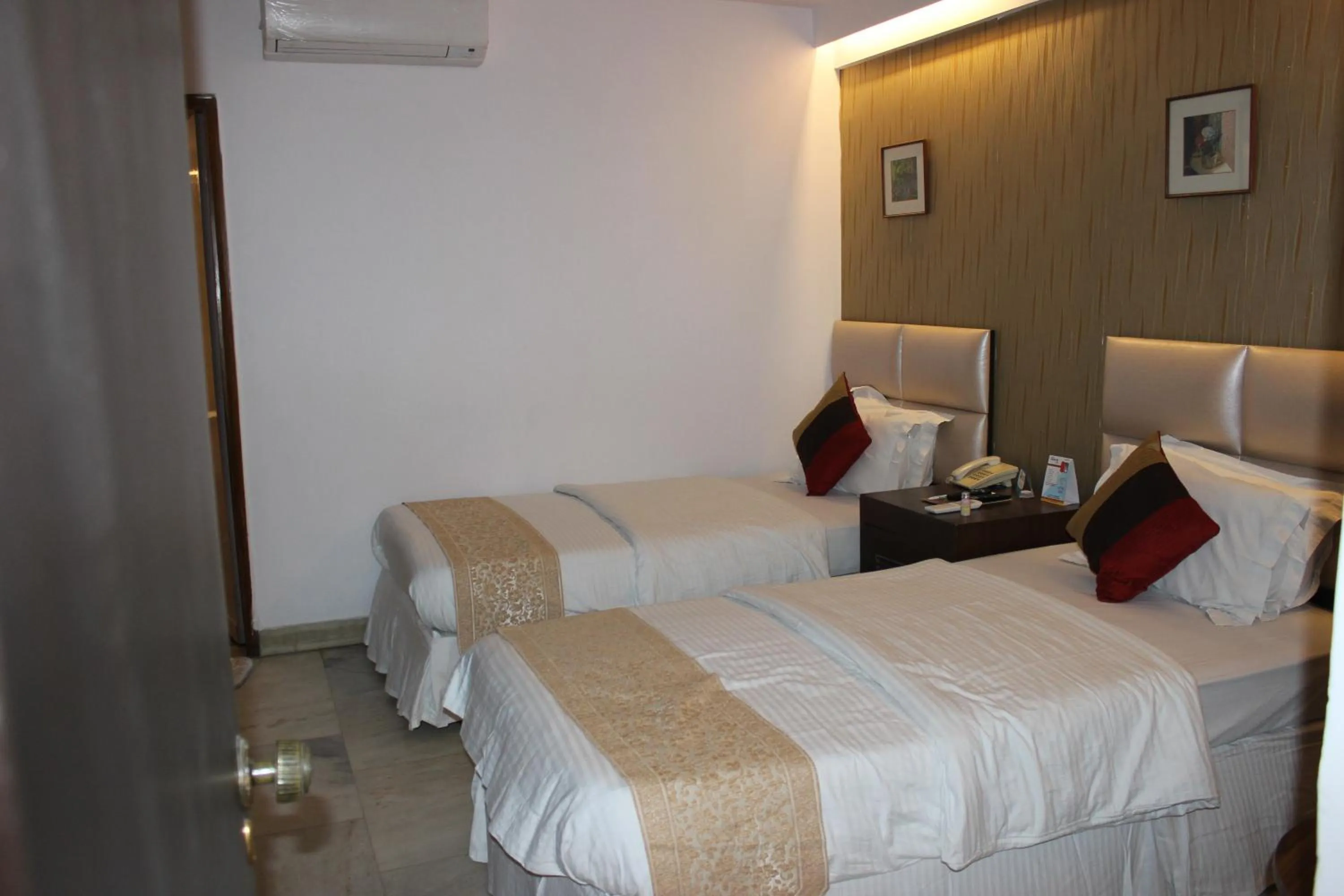 Bed in Hotel Jukaso Inn Down Town