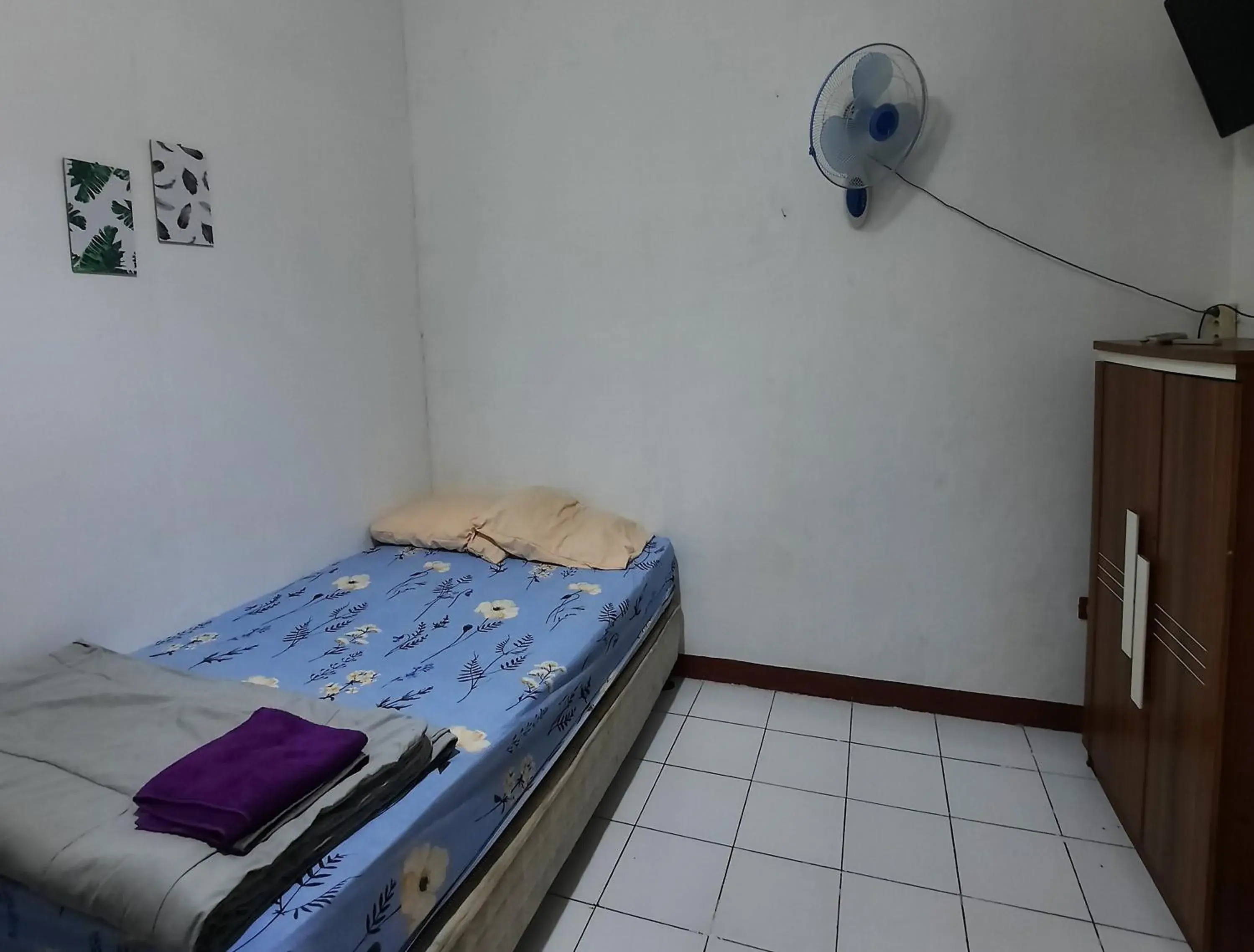 Bed in OYO 90712 Wisma Acidalia Syariah