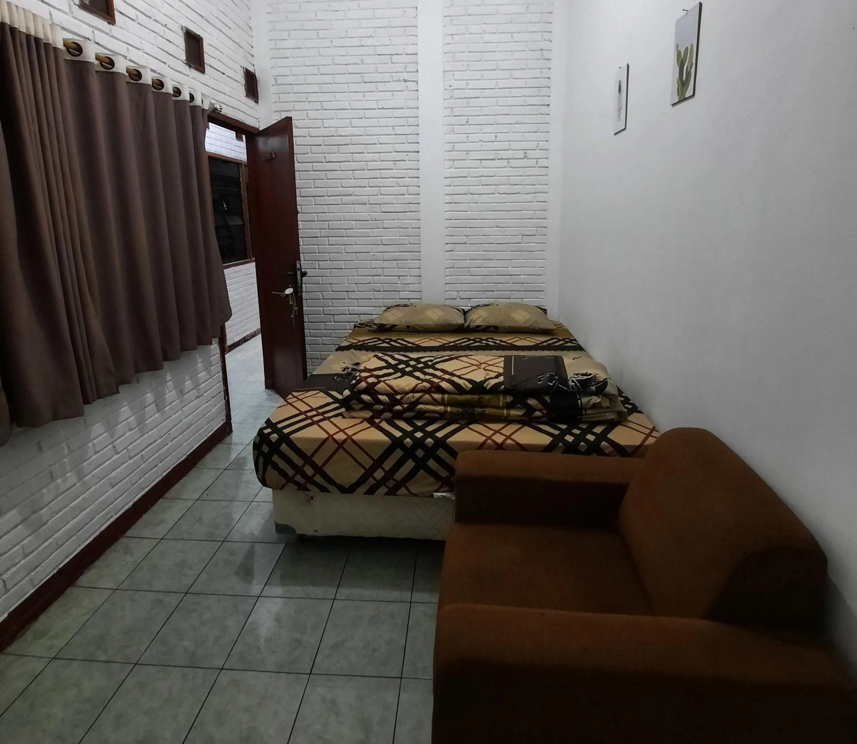 Bed in WISMA ACIDALIA SYARIAH