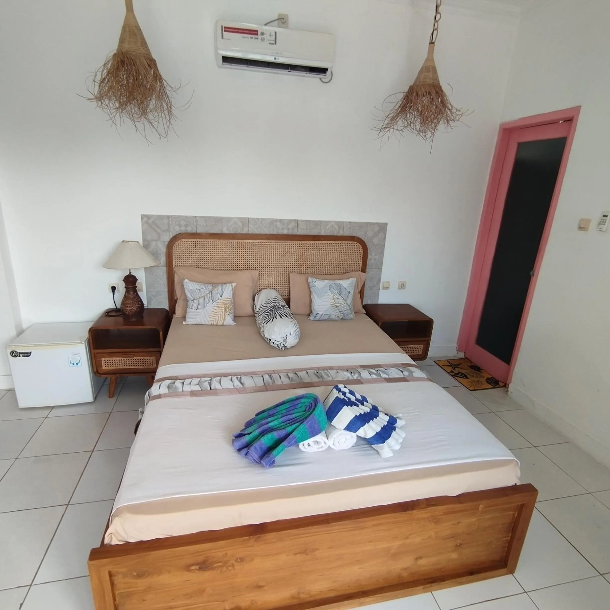 Bed in Palm Trees Villas
