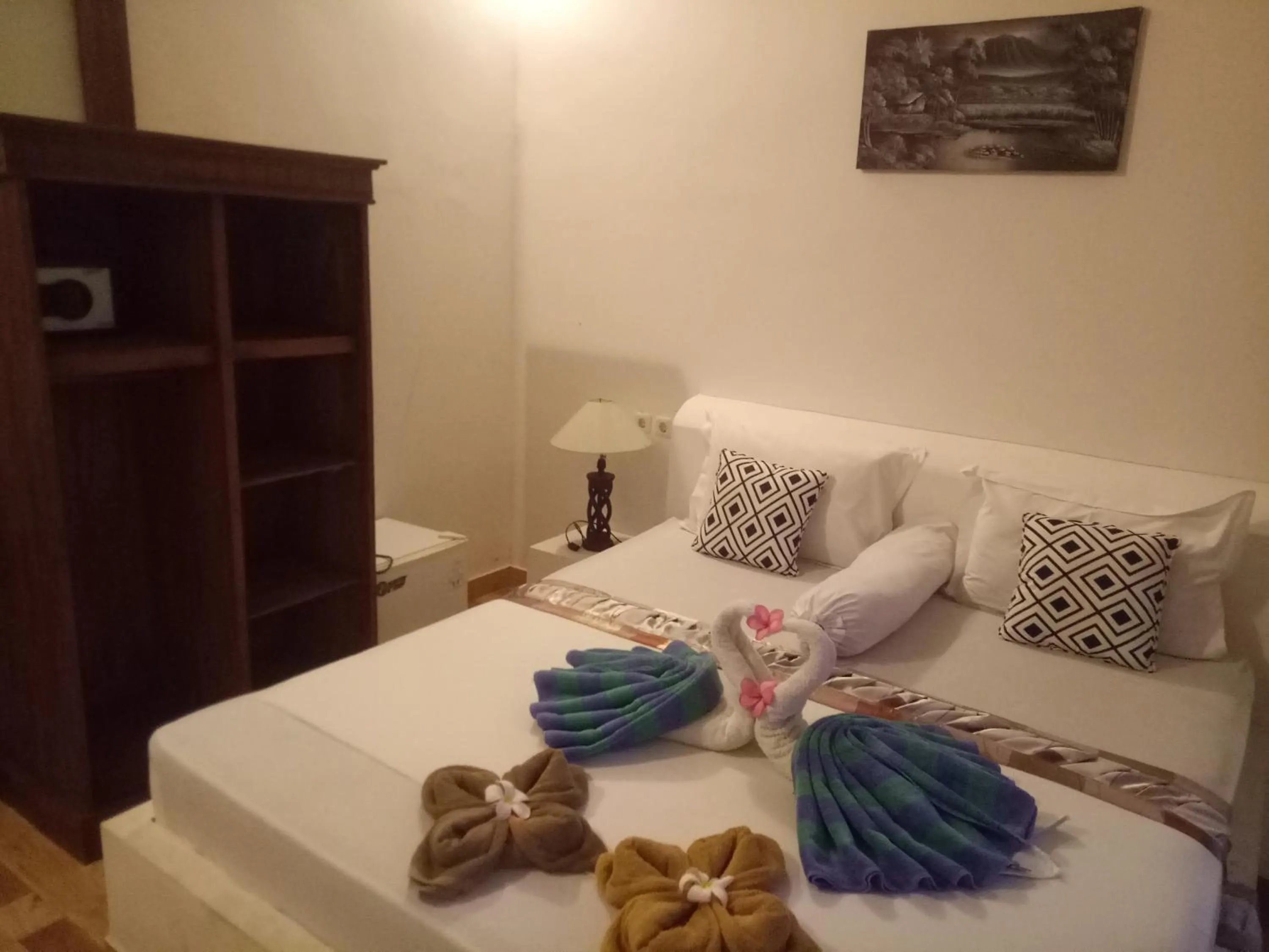 Bed in Palm Trees Villas