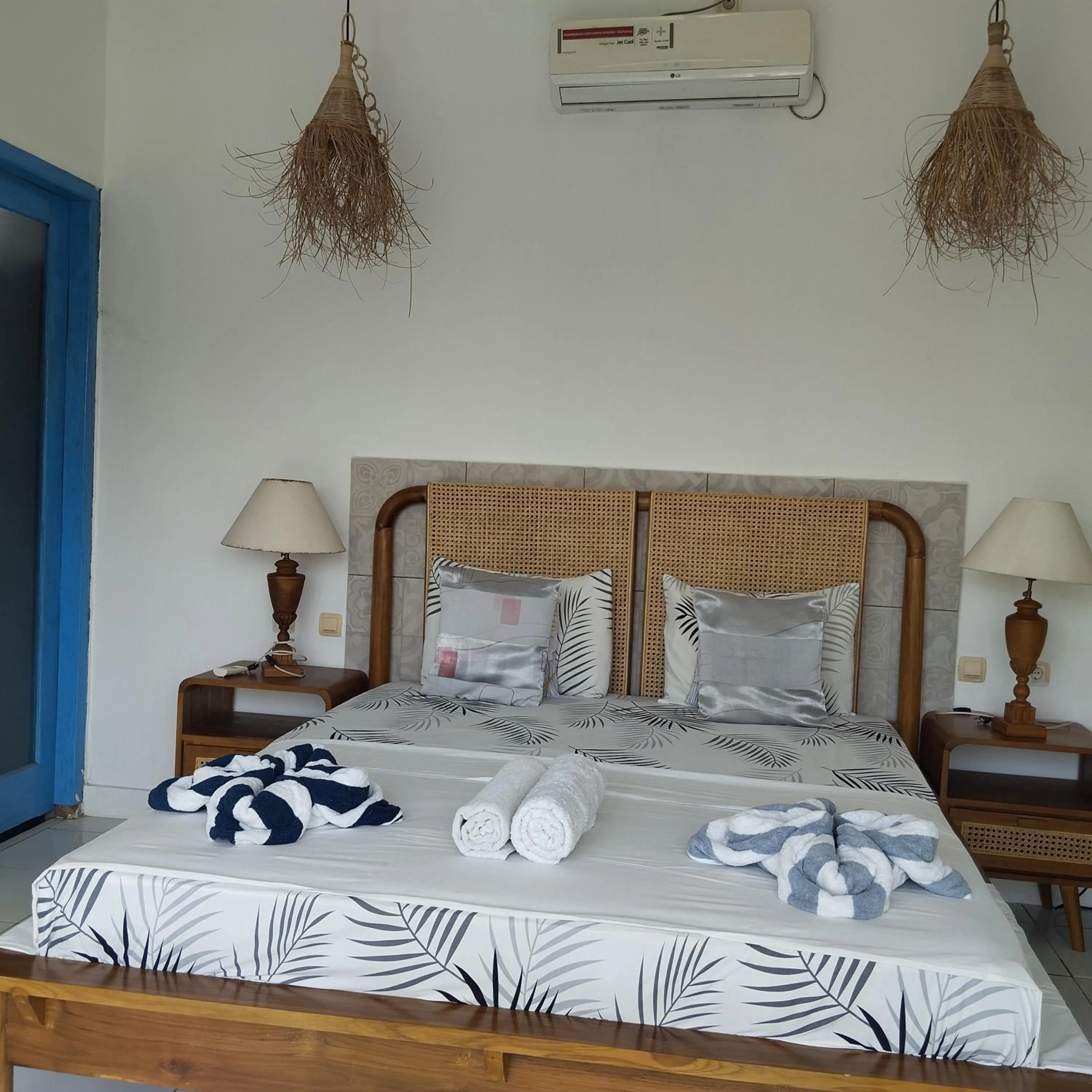 Bed in Palm Trees Villas