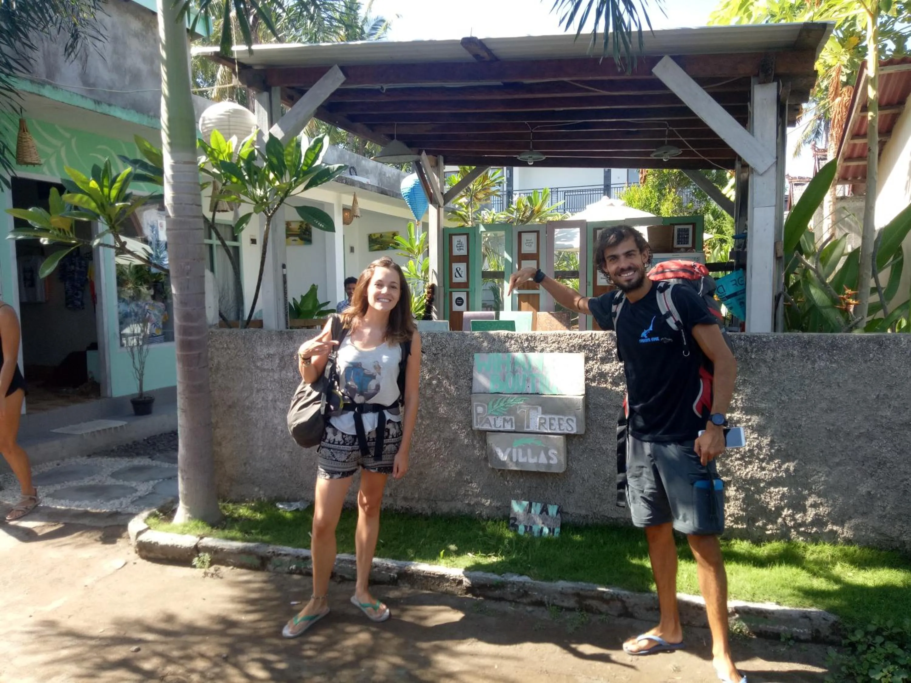 People in Palm Trees Villas