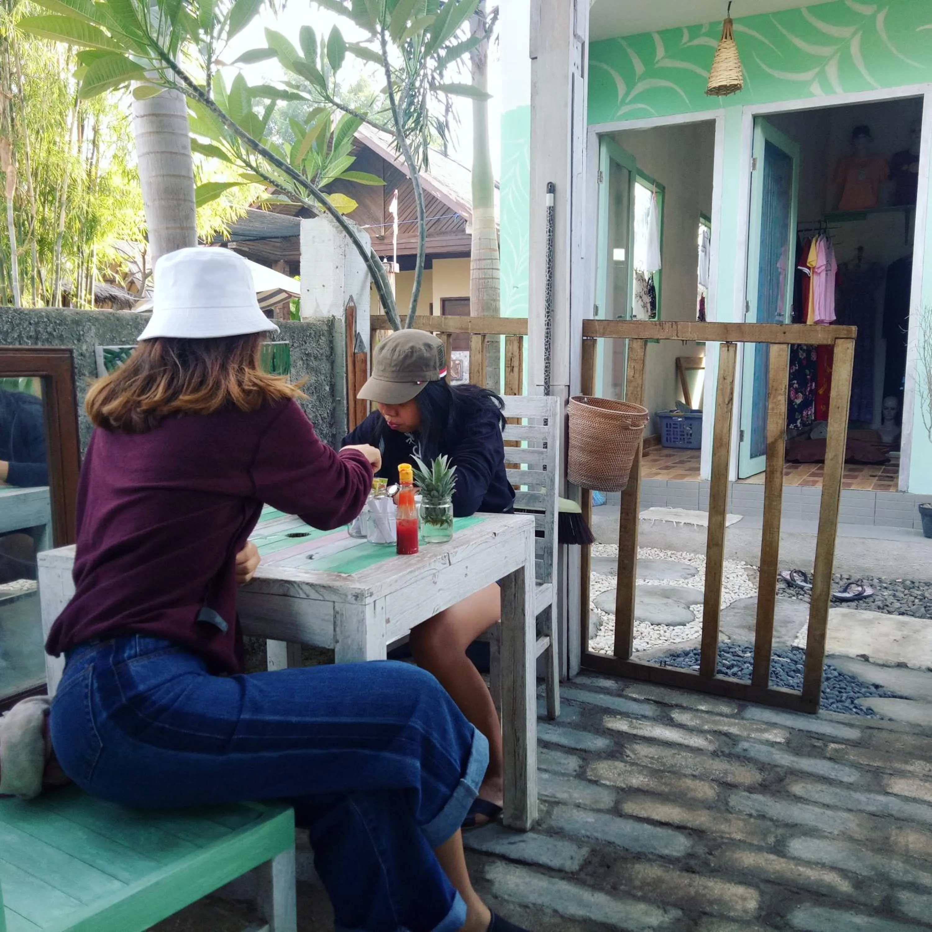 People in Palm Trees Villas