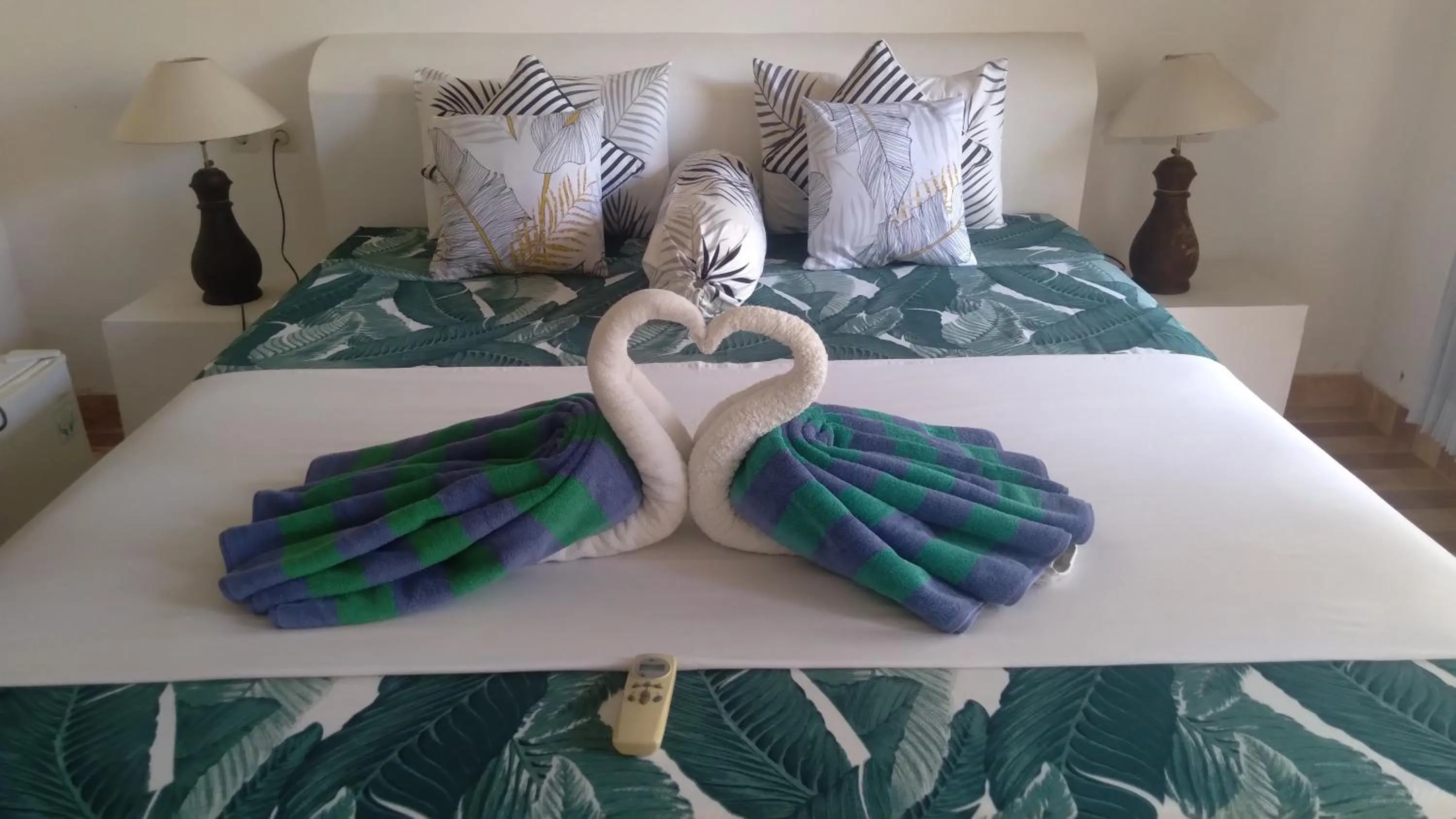 Bed in Palm Trees Villas