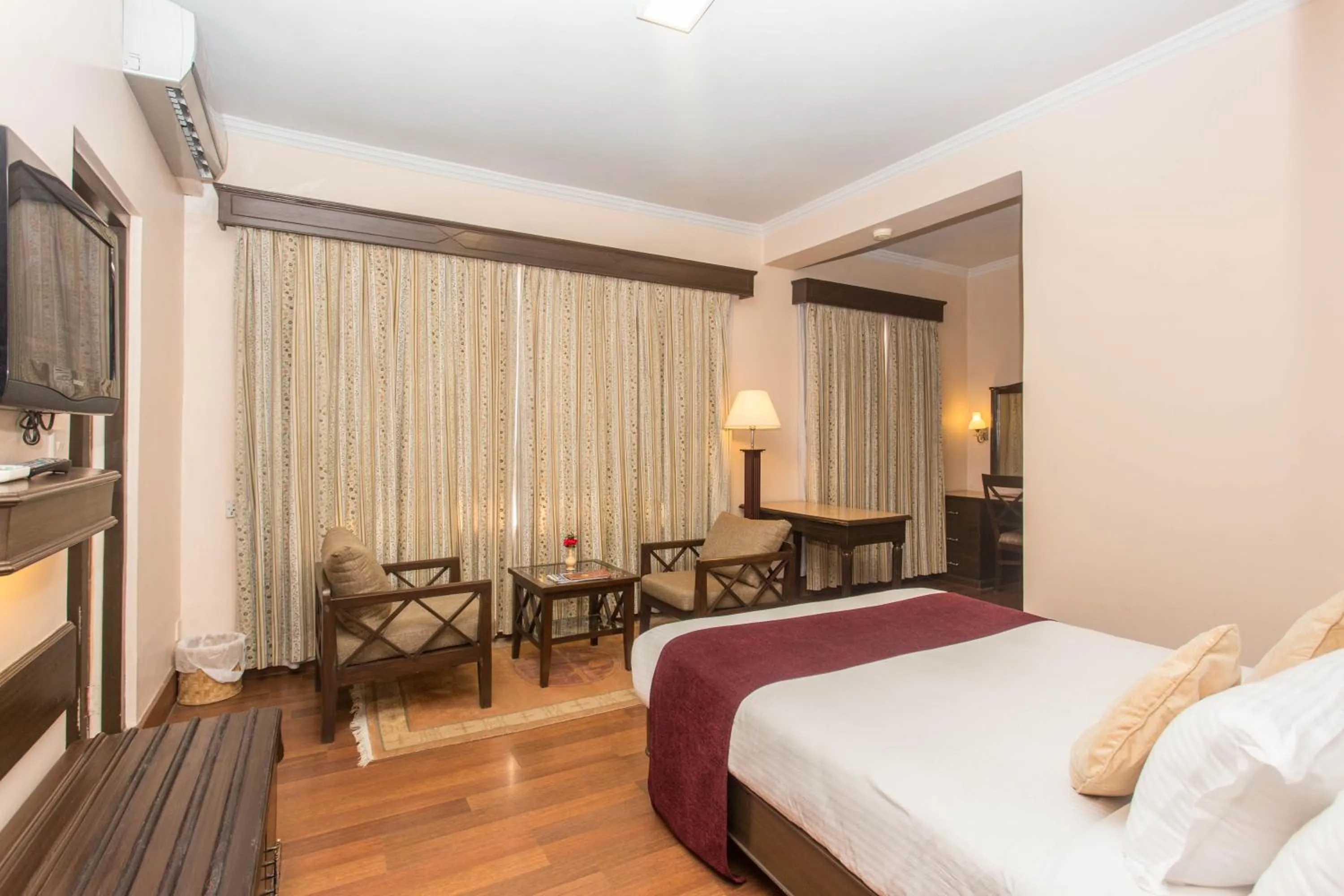 TV and multimedia, Bed in Hotel Marshyangdi