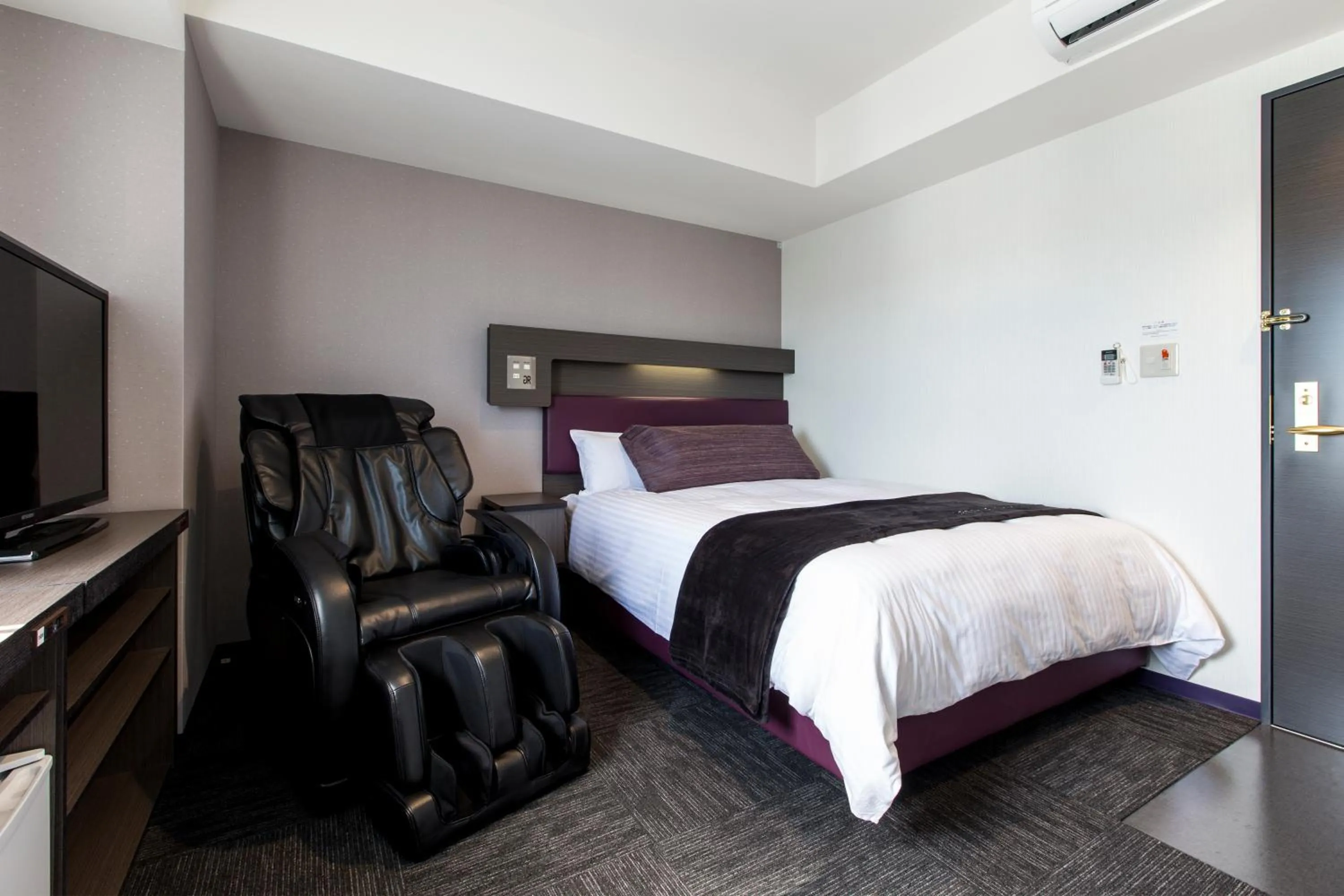 Bed in Green Rich Hotel Izumo (Artificial hot spring Futamata Yunohana)