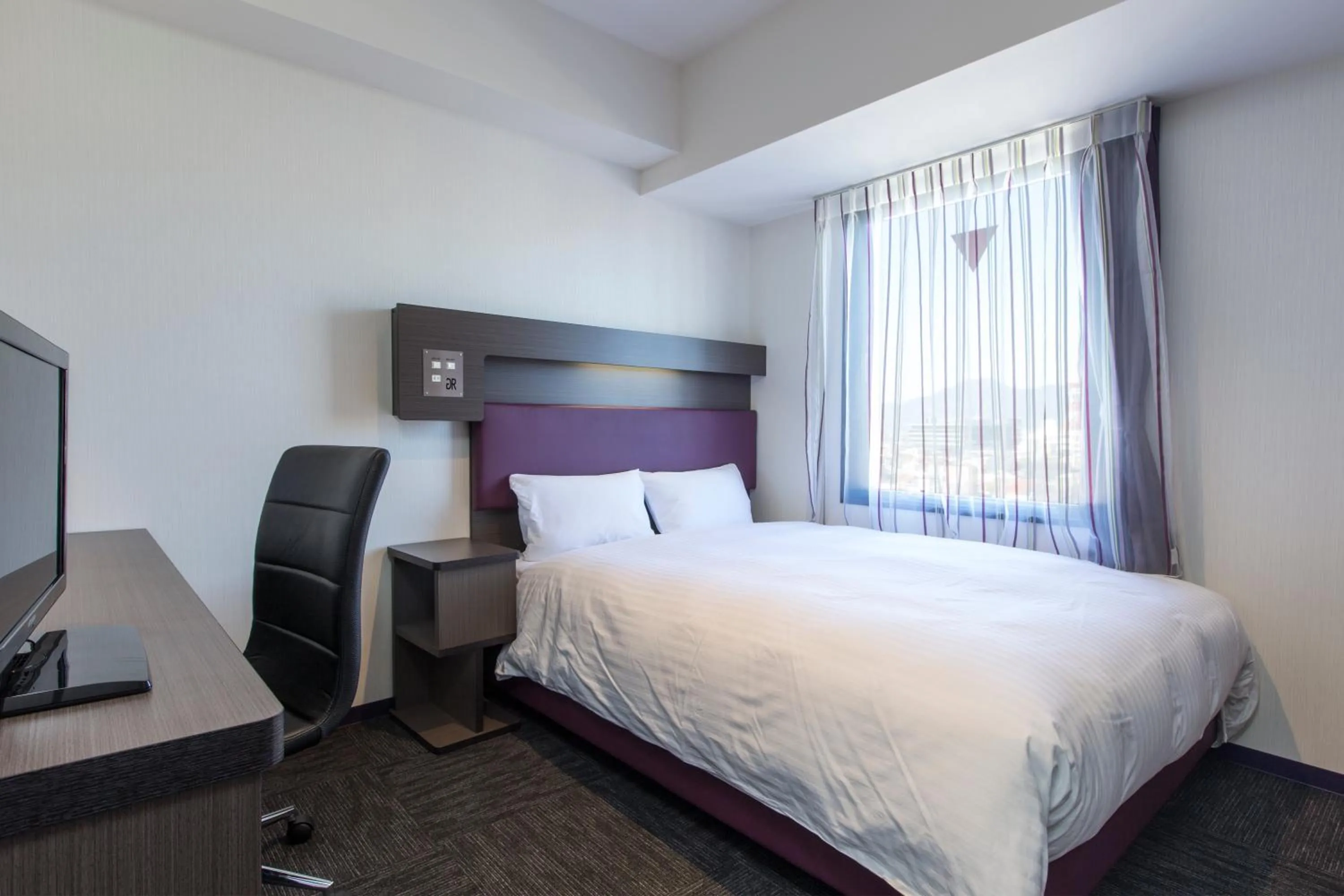 Bed in Green Rich Hotel Izumo (Artificial hot spring Futamata Yunohana)