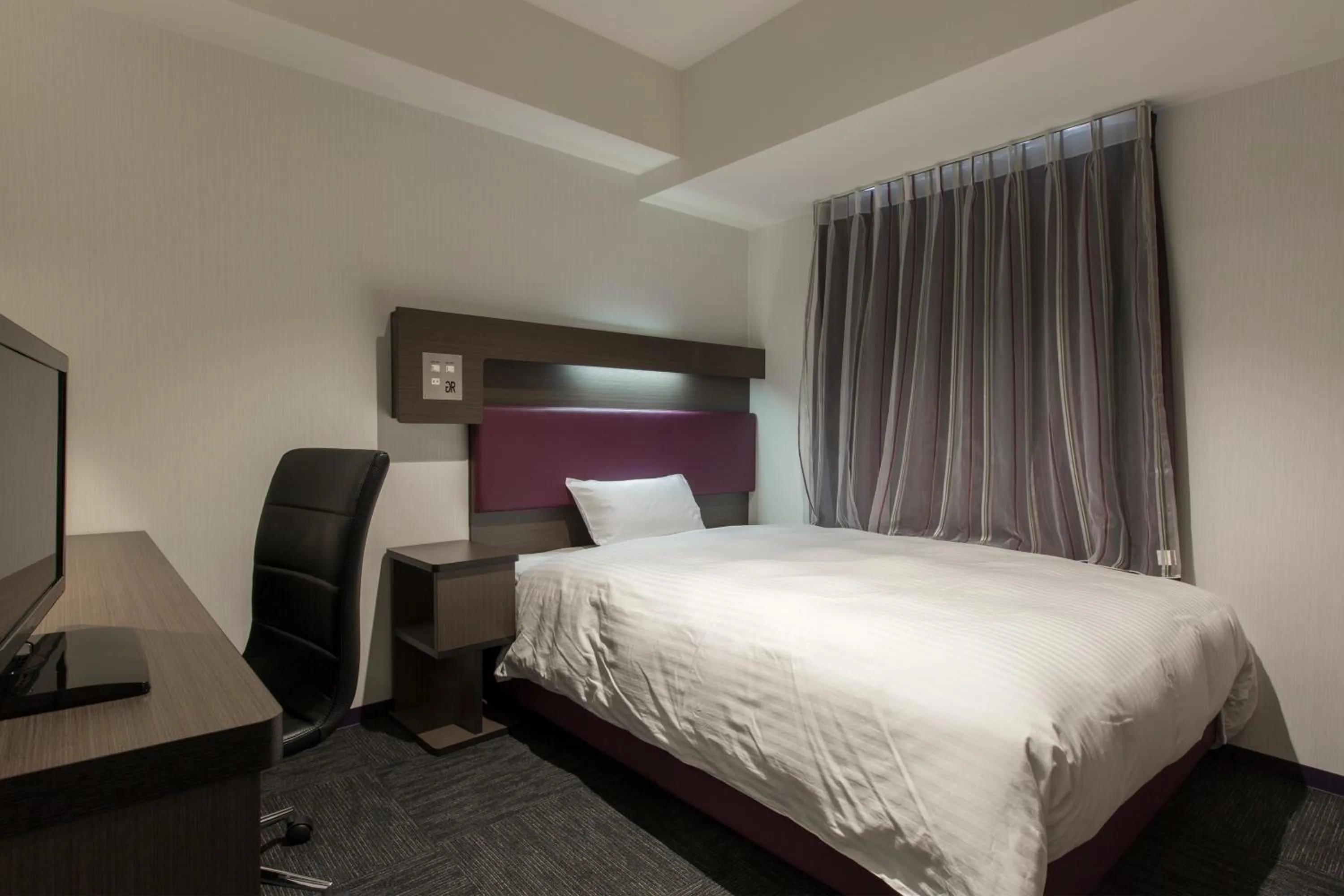 Bed in Green Rich Hotel Izumo (Artificial hot spring Futamata Yunohana)