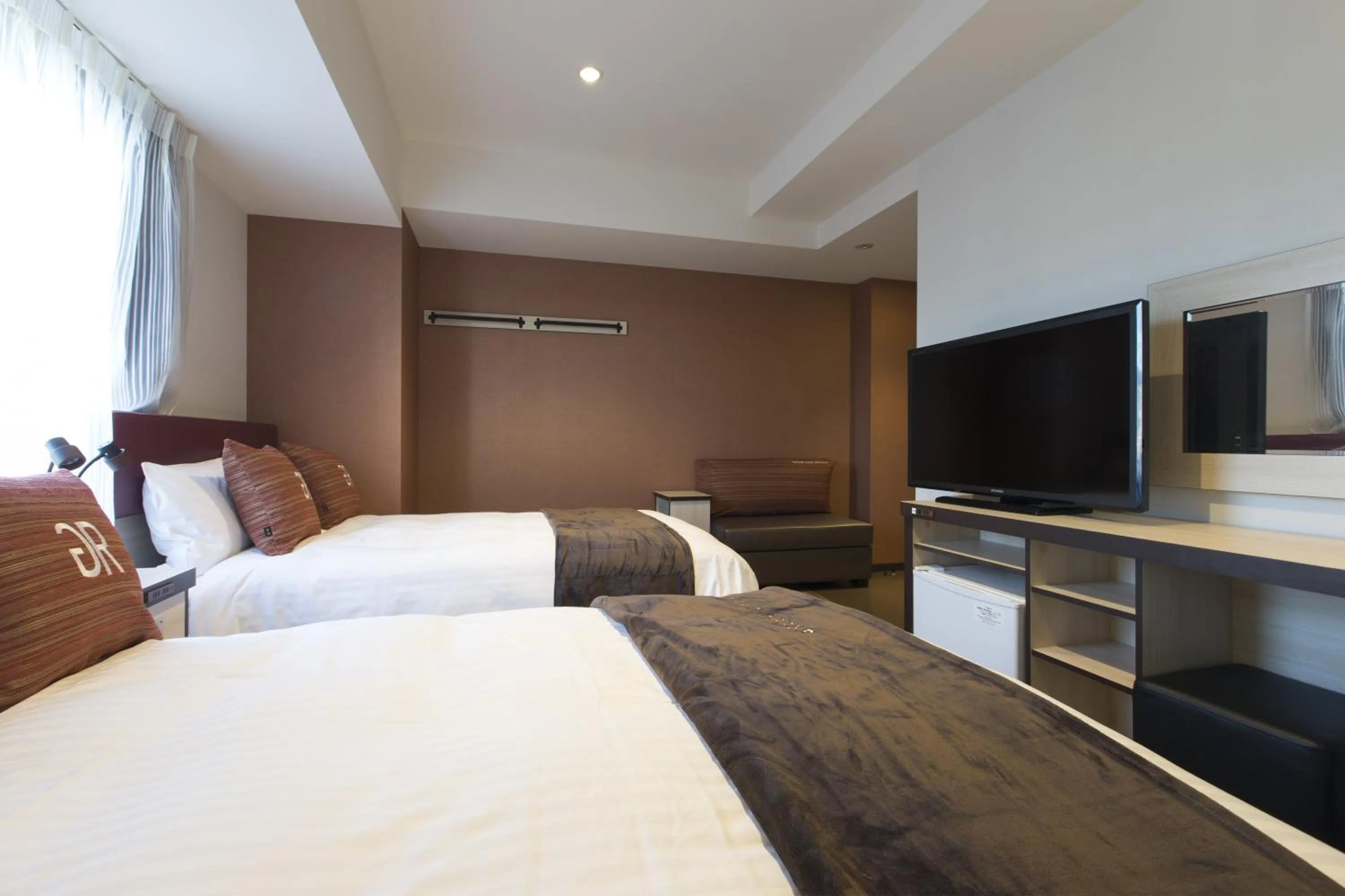 Bed in Green Rich Hotel Izumo (Artificial hot spring Futamata Yunohana)