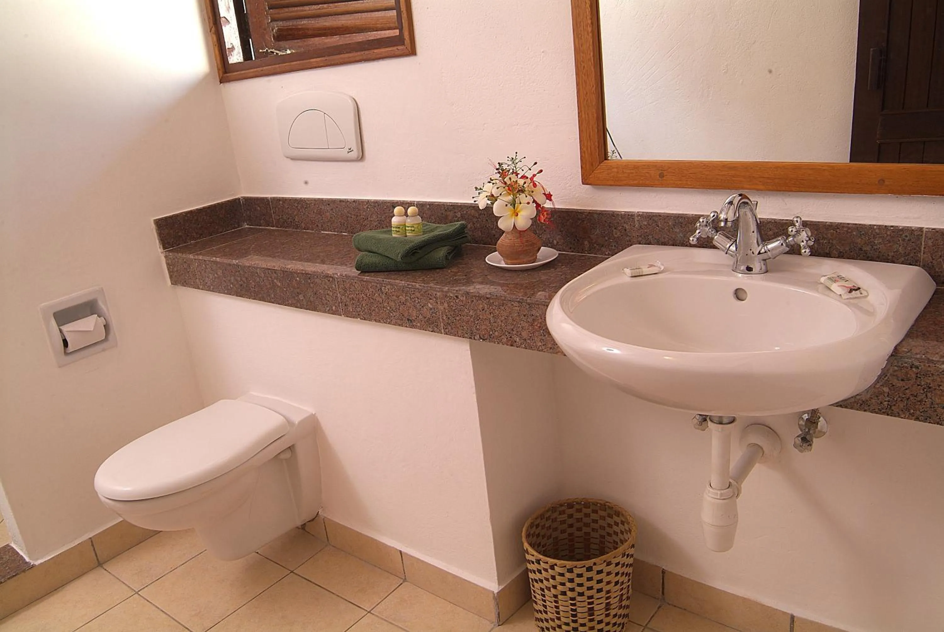 Toilet in Pinewood Beach Resort and Spa
