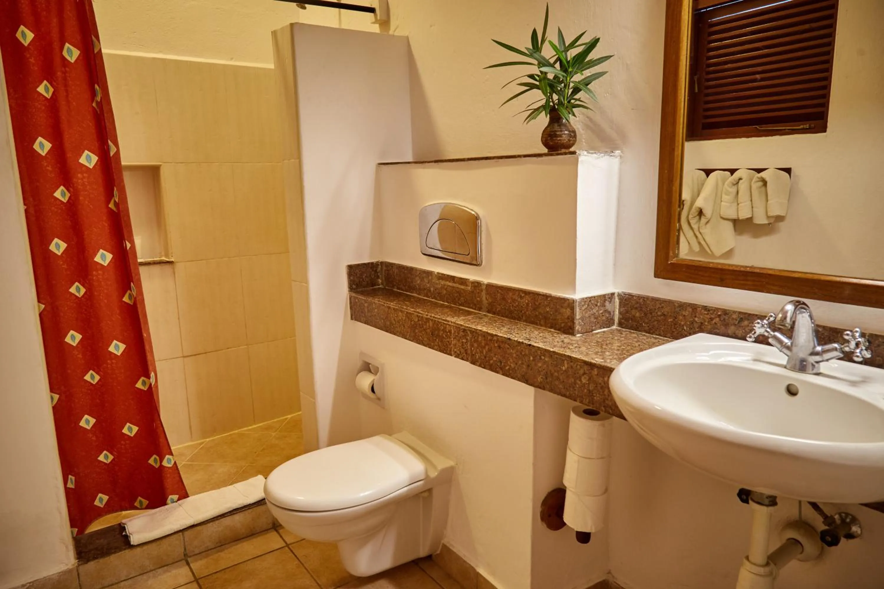 Bathroom in Pinewood Beach Resort and Spa