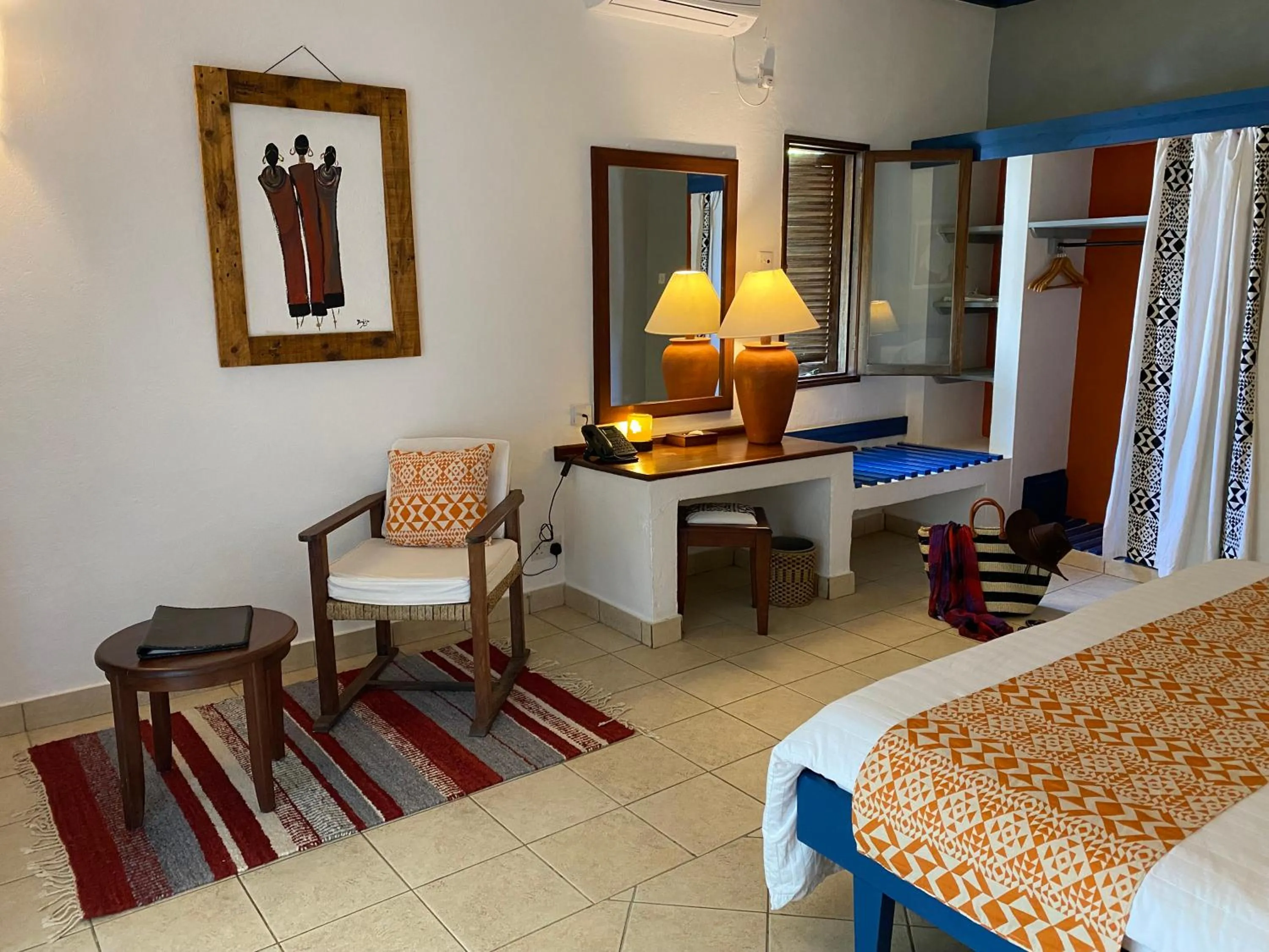 Seating area, Bed in Pinewood Beach Resort and Spa